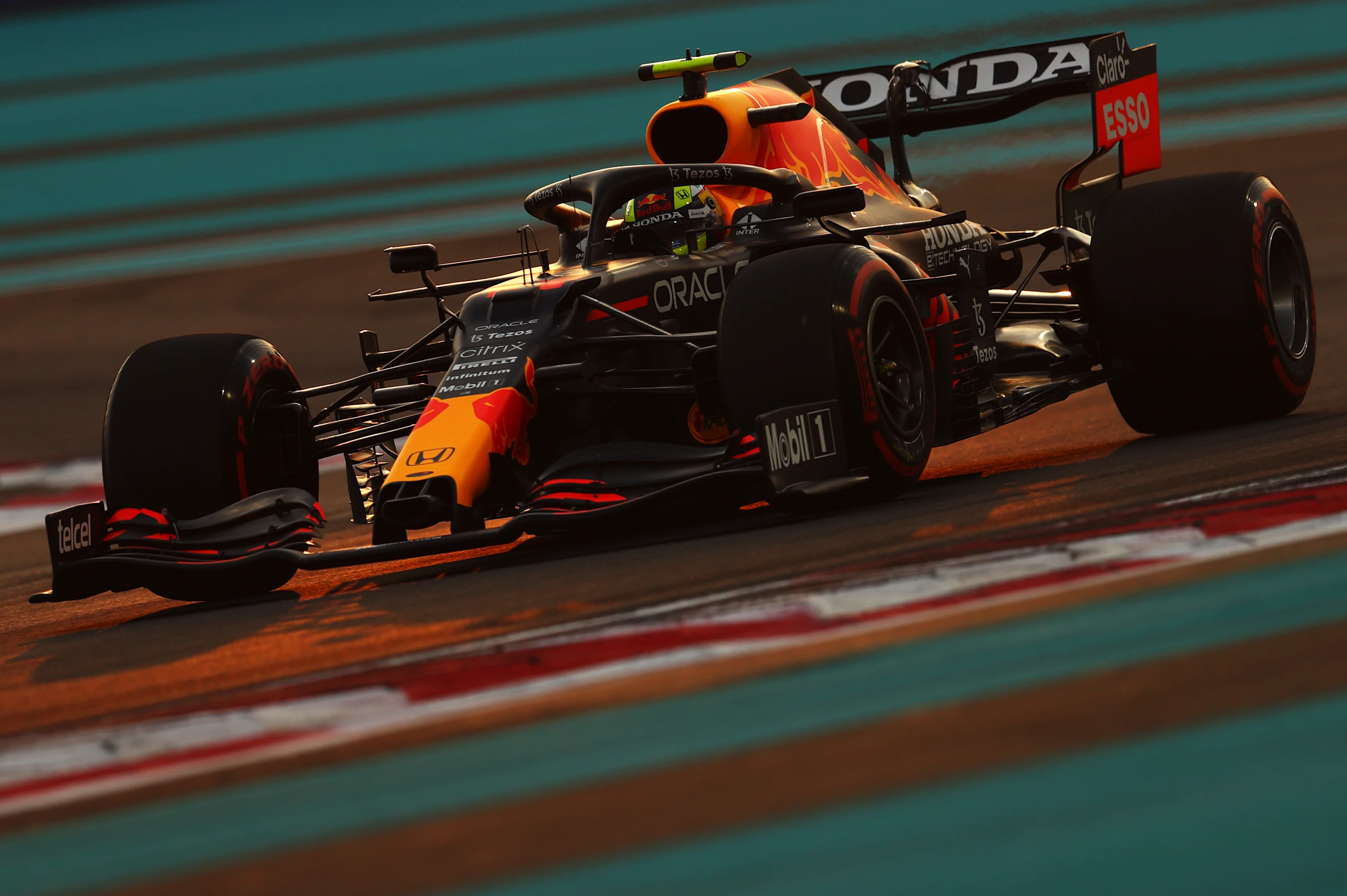 ABU DHABI, UNITED ARAB EMIRATES - DECEMBER 11: Sergio Perez of Mexico driving the (11) Red Bull