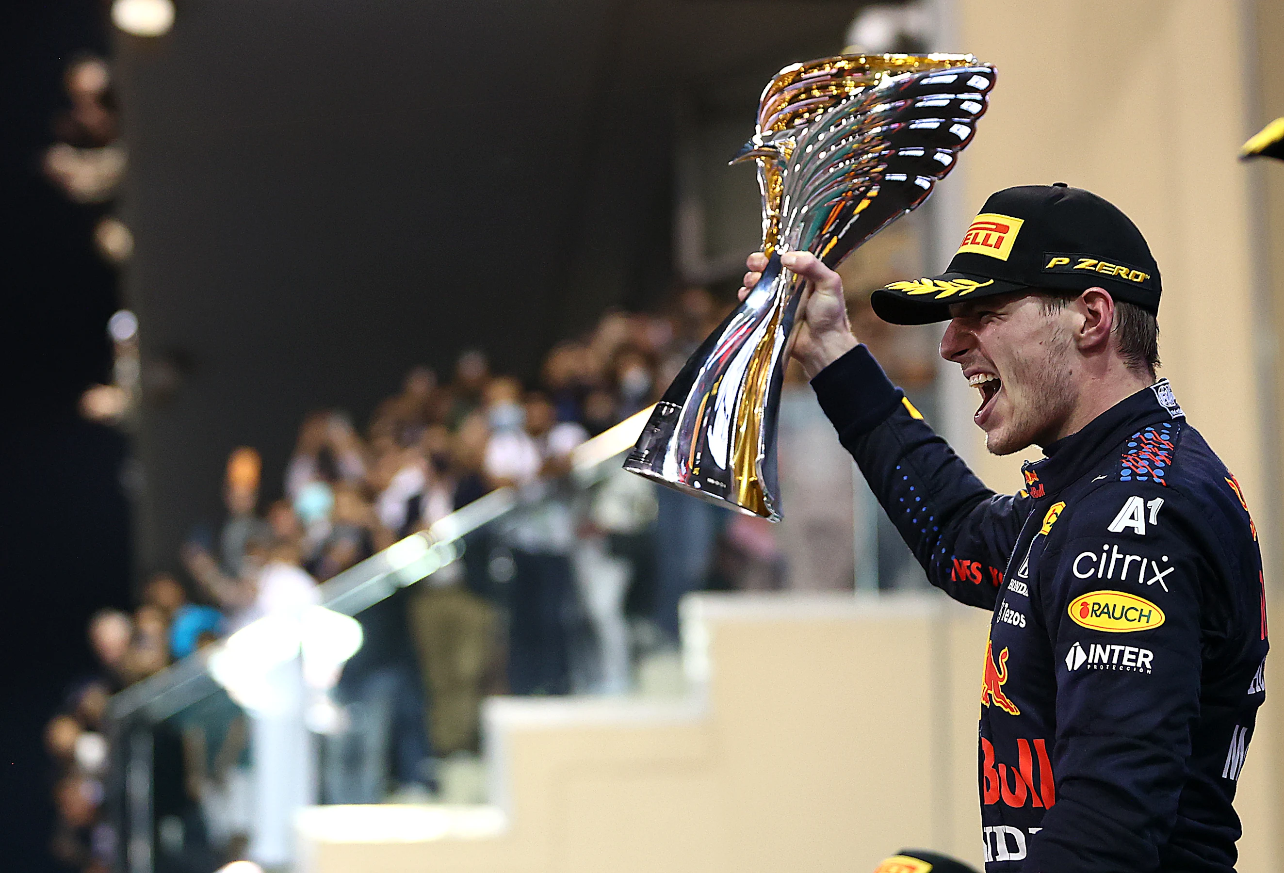 ABU DHABI, UNITED ARAB EMIRATES - DECEMBER 12: Race winner and 2021 F1 World Drivers Champion Max
