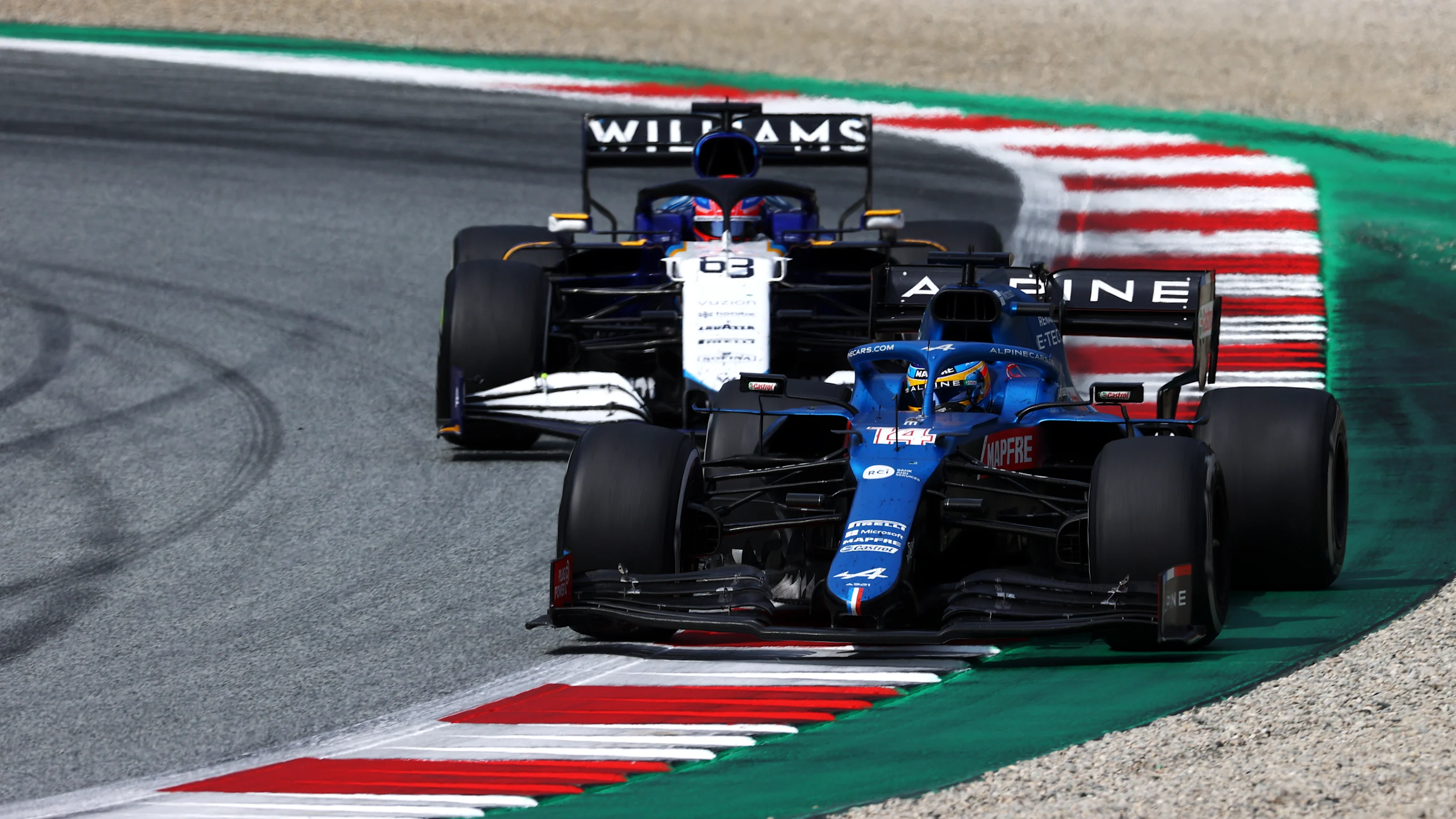 SPIELBERG, AUSTRIA - JULY 04: Fernando Alonso of Spain driving the (14) Alpine A521 Renault leads