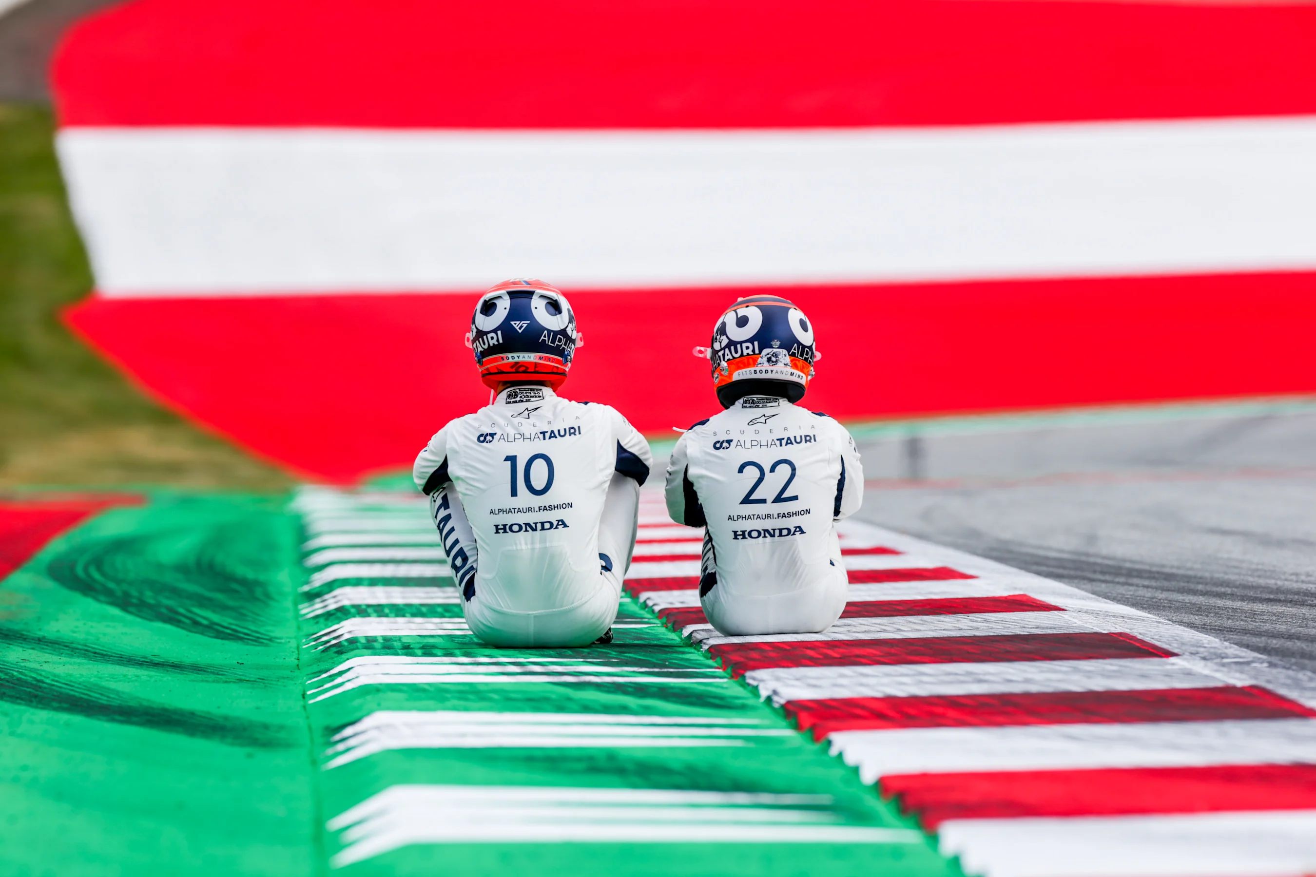 SPIELBERG, AUSTRIA - JULY 01: Pierre Gasly of Scuderia AlphaTauri and France with Yuki Tsunoda of