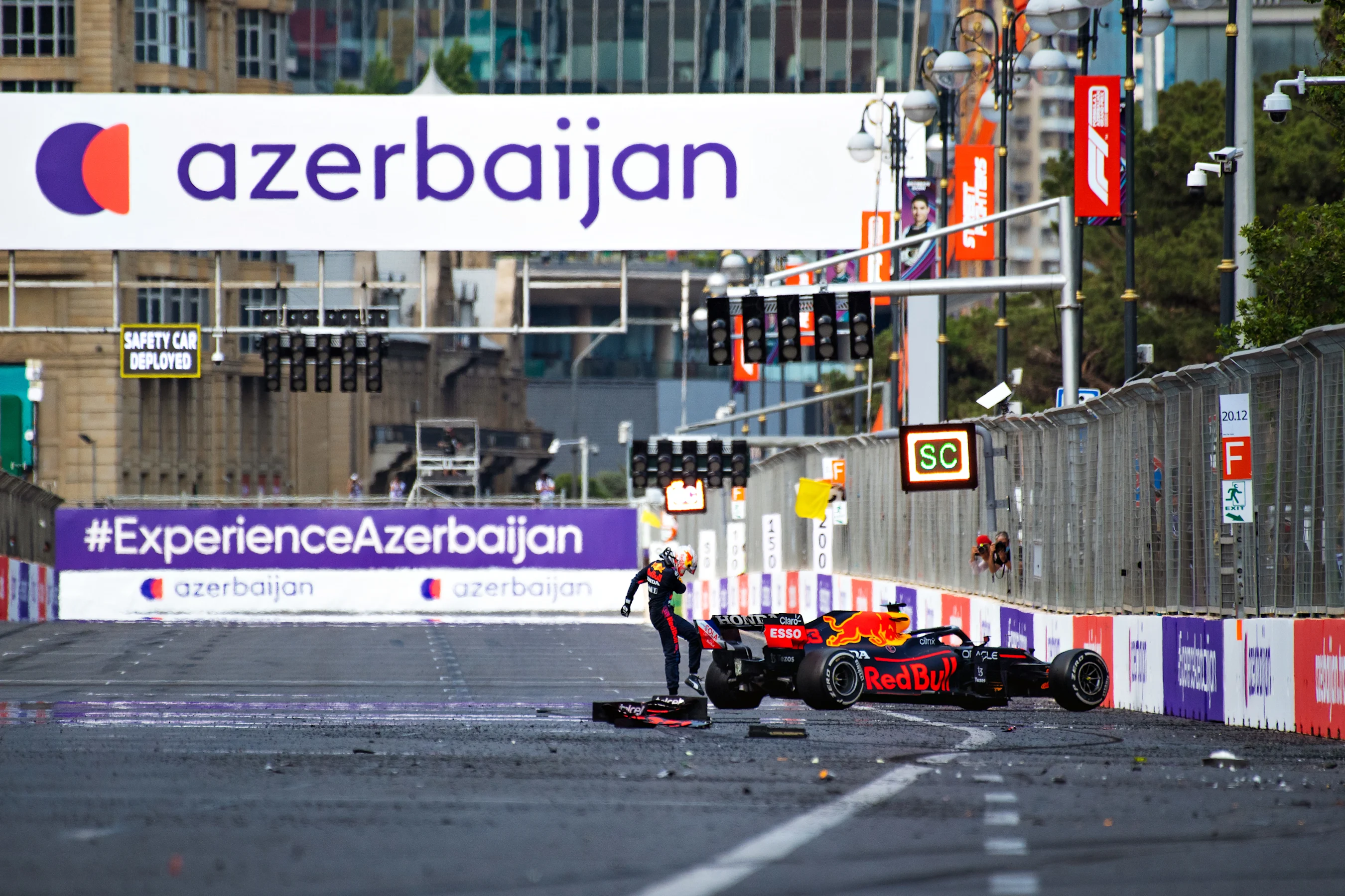BAKU, AZERBAIJAN - JUNE 06:Max Verstappen of Netherlands and Red Bull Racing kicks his tyre as he