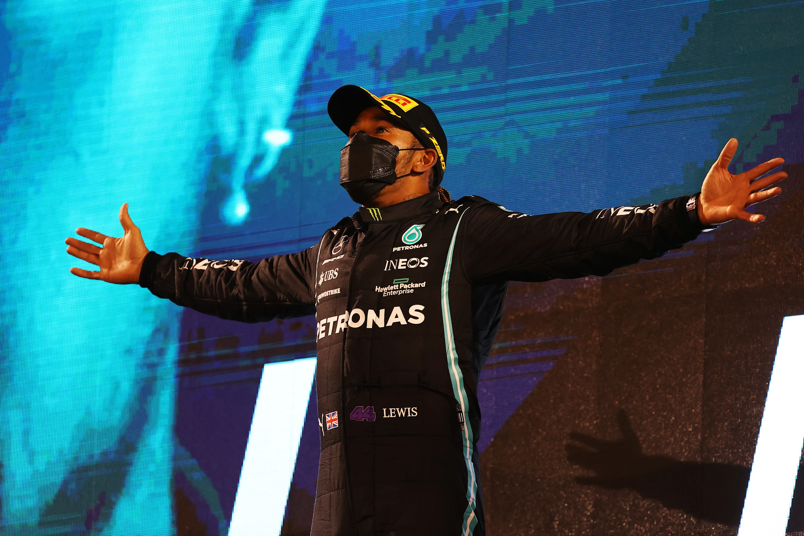 BAHRAIN, BAHRAIN - MARCH 28: Race winner Lewis Hamilton of Great Britain and Mercedes GP celebrates