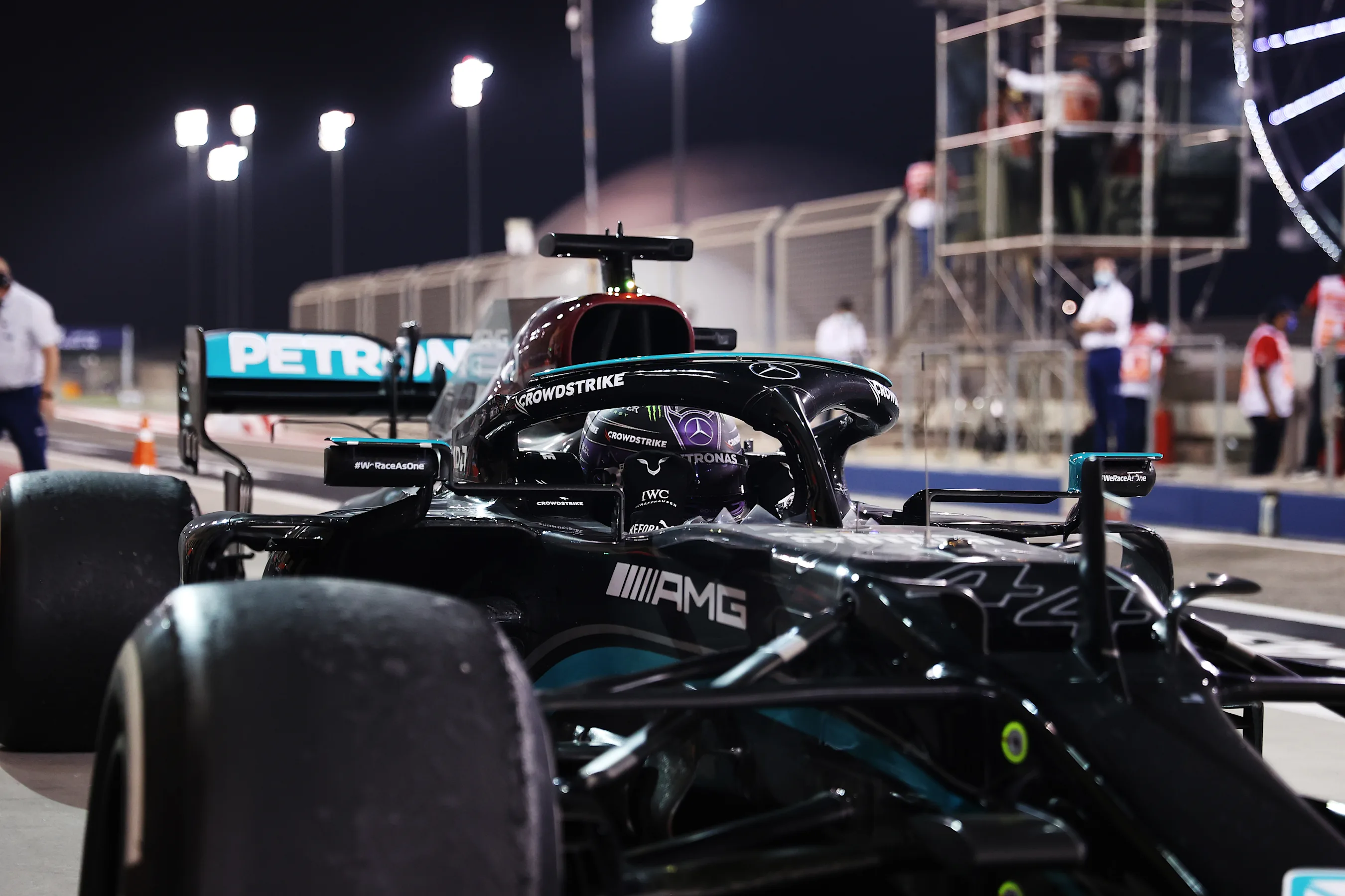 BAHRAIN, BAHRAIN - MARCH 28: Race Winner, Lewis Hamilton of Great Britain and Mercedes GP stops in