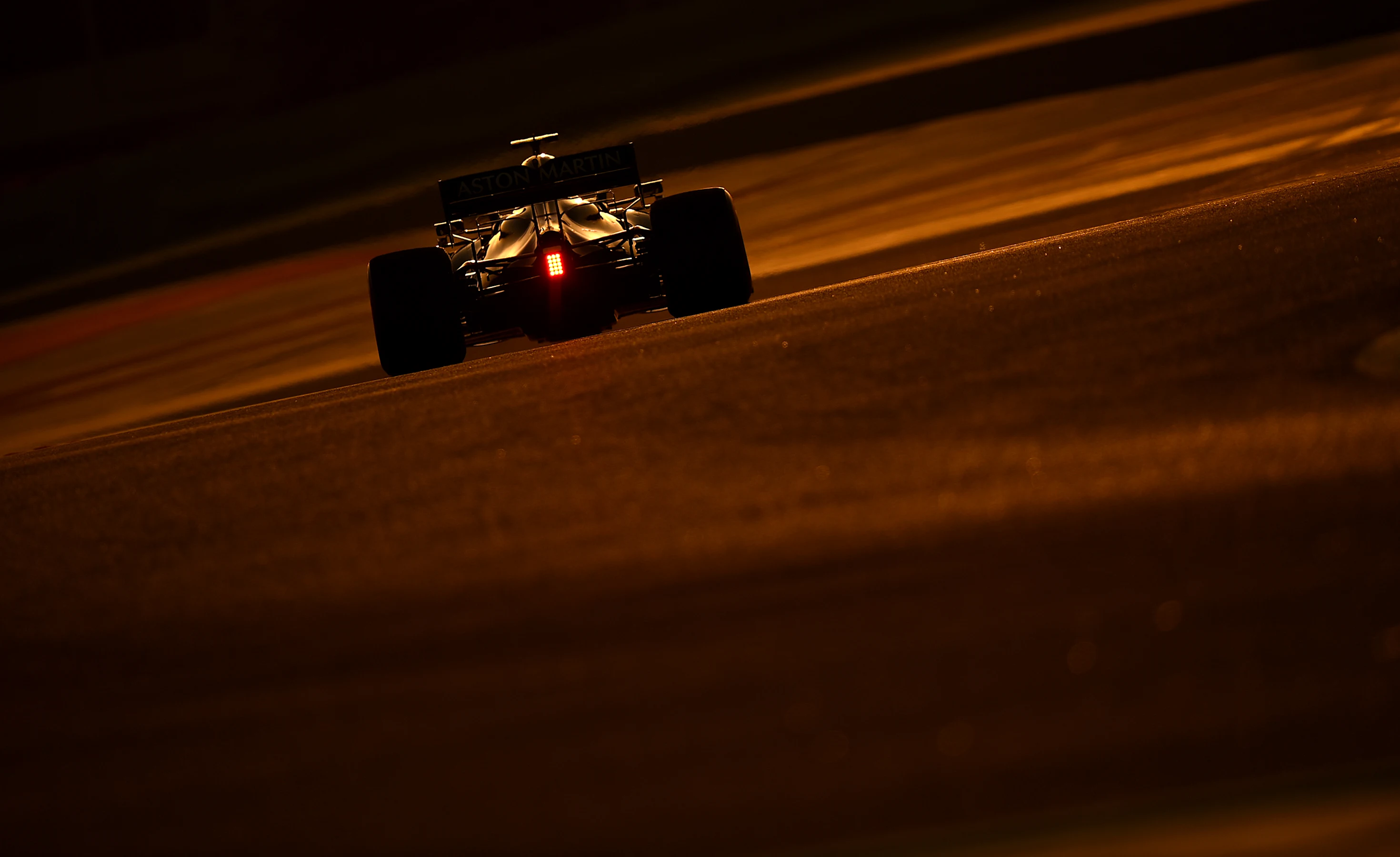 BAHRAIN, BAHRAIN - MARCH 28: Sebastian Vettel of Germany driving the (5) Aston Martin AMR21