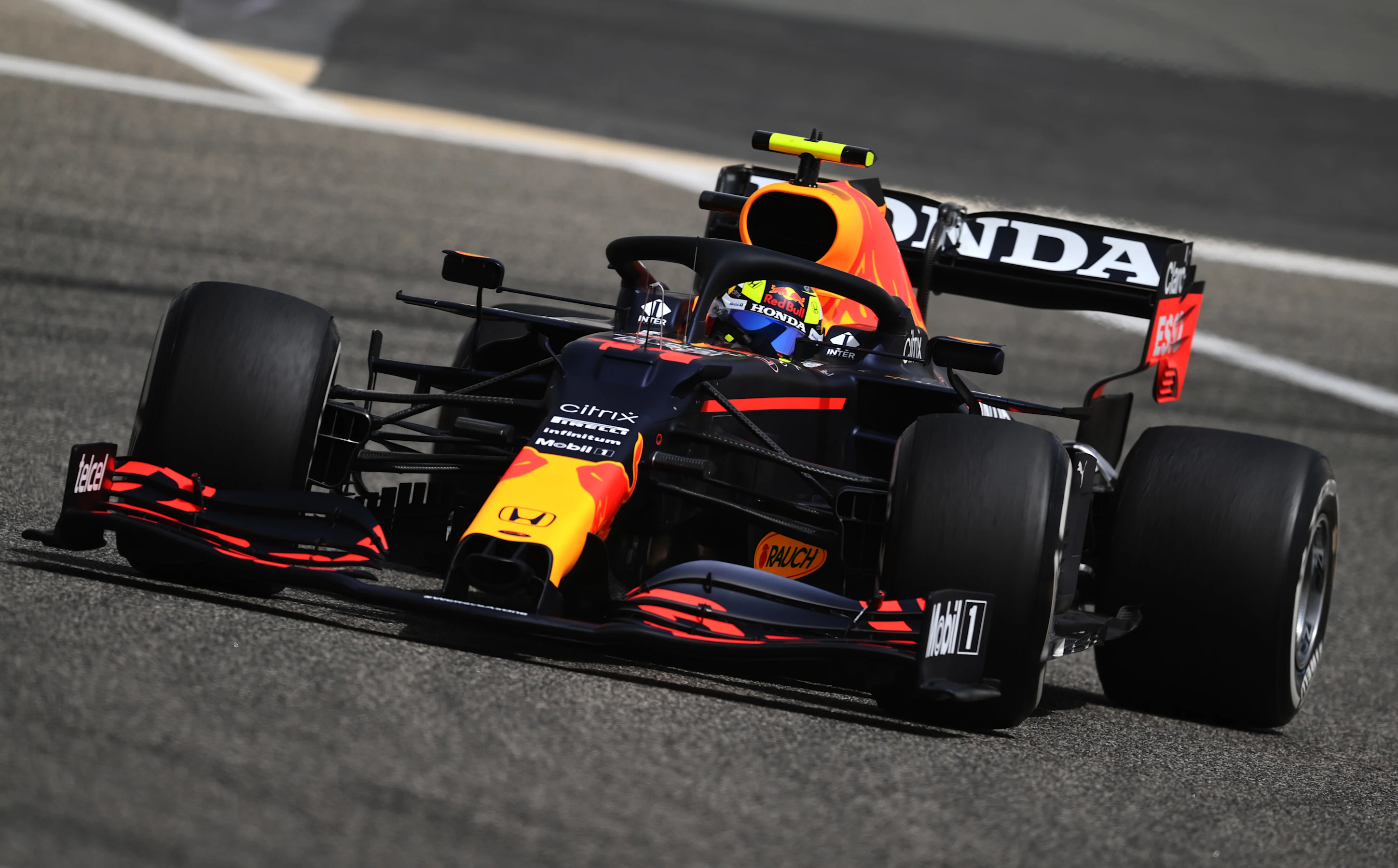 BAHRAIN, BAHRAIN - MARCH 13: Sergio Perez of Mexico driving the (11) Red Bull Racing RB16B Honda on
