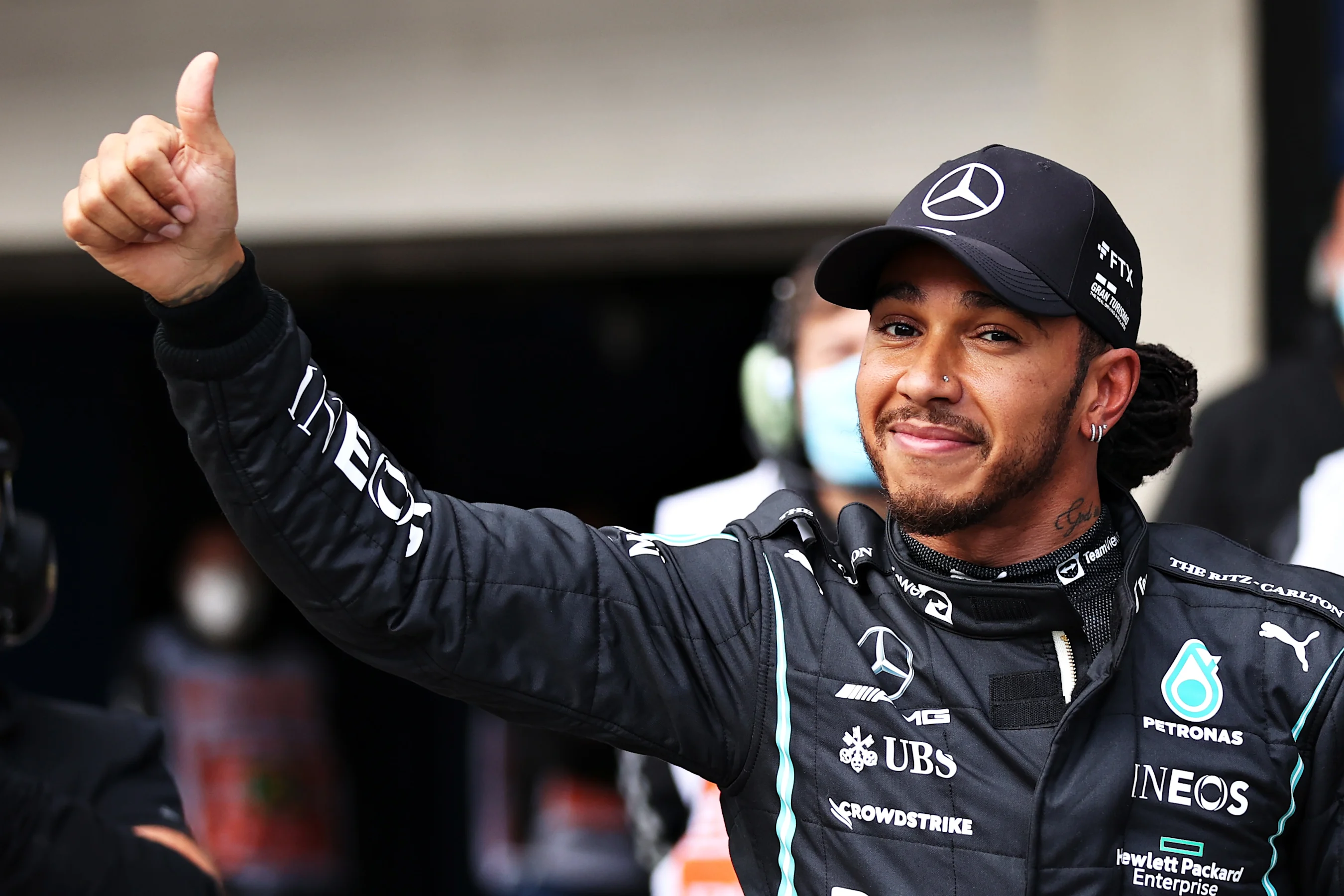 SAO PAULO, BRAZIL - NOVEMBER 12: Fastest qualifier Lewis Hamilton of Great Britain and Mercedes GP