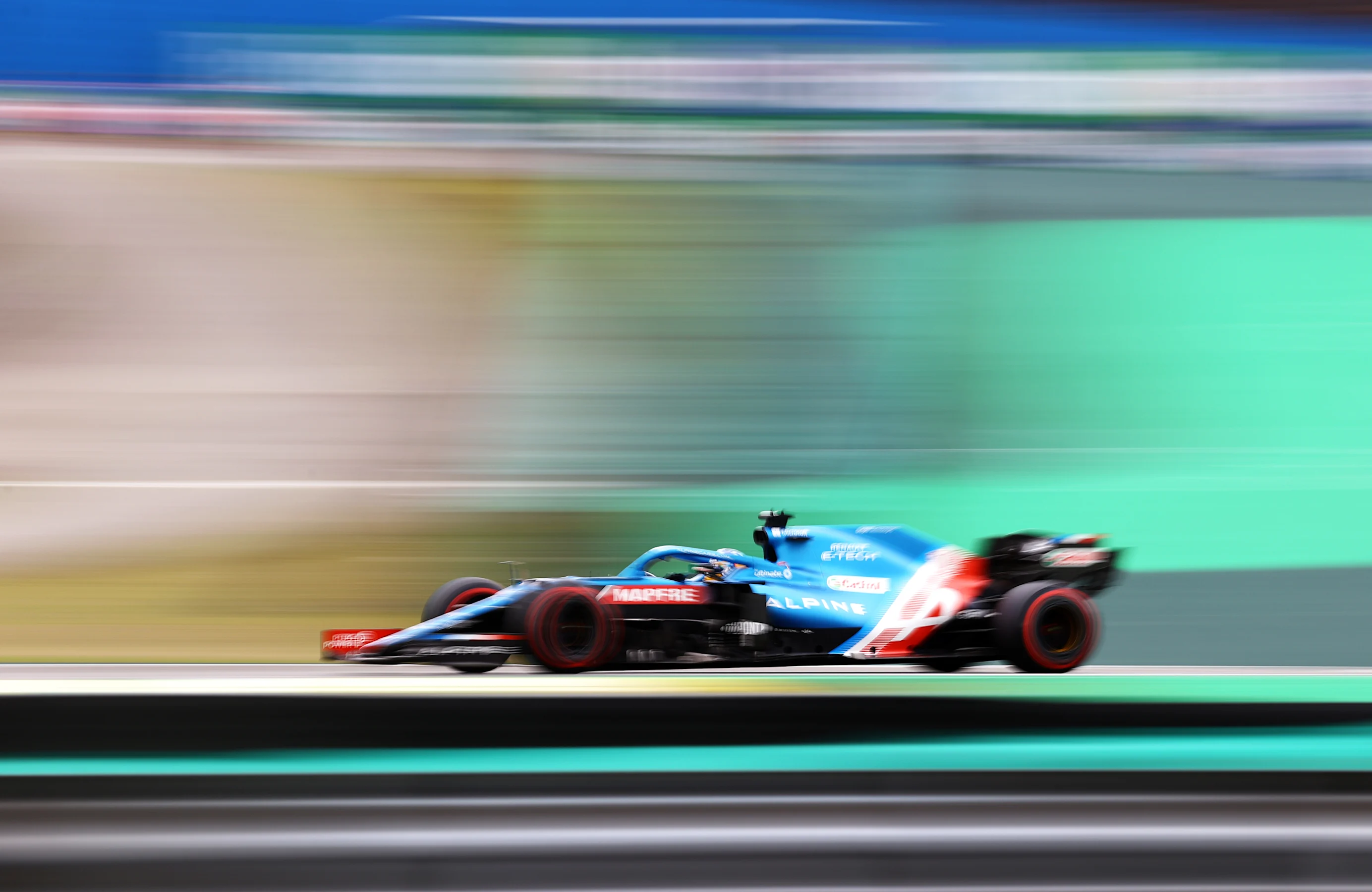 SAO PAULO, BRAZIL - NOVEMBER 12: Fernando Alonso of Spain driving the (14) Alpine A521 Renault