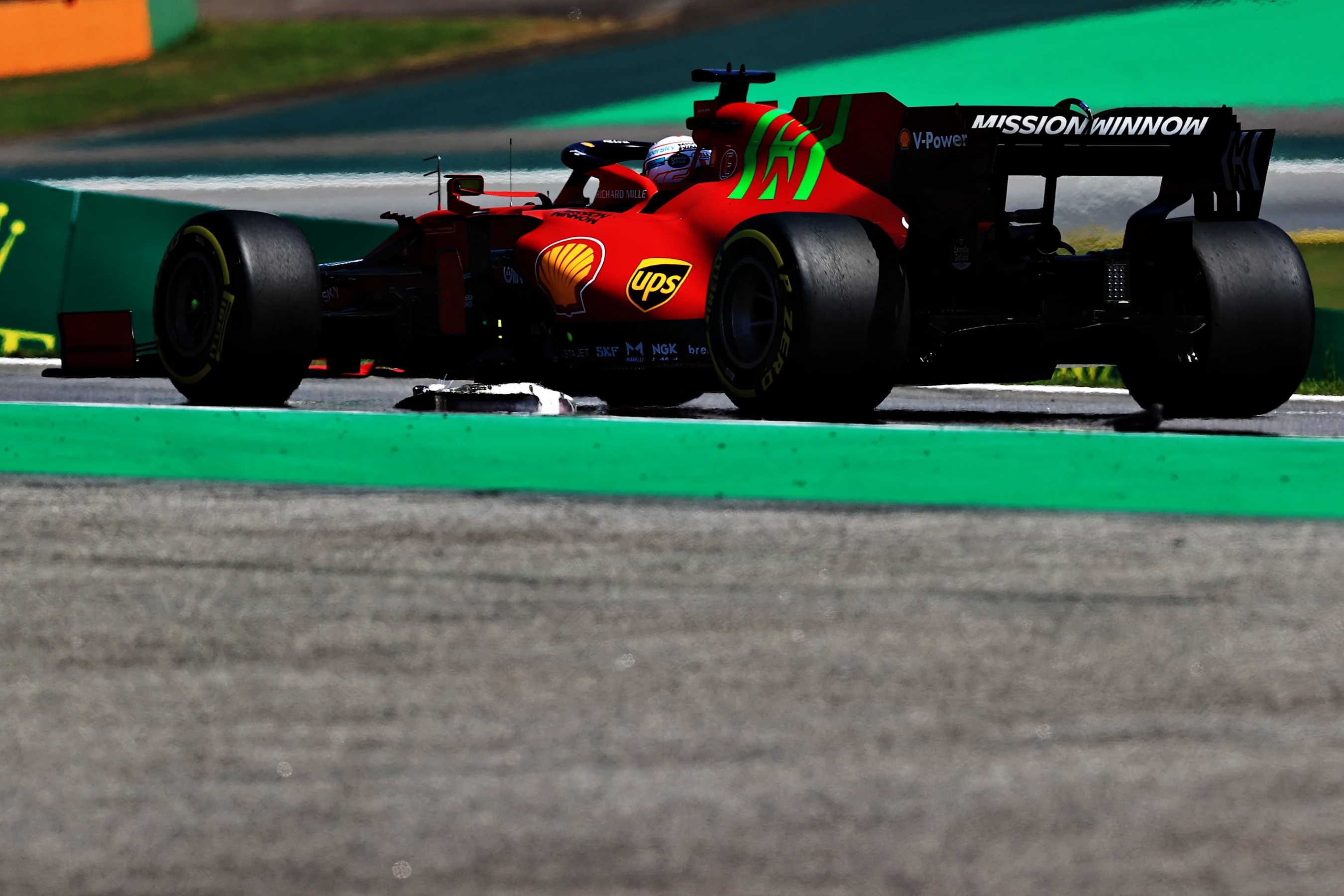 SAO PAULO, BRAZIL - NOVEMBER 14: Charles Leclerc of Monaco driving the (16) Scuderia Ferrari SF21