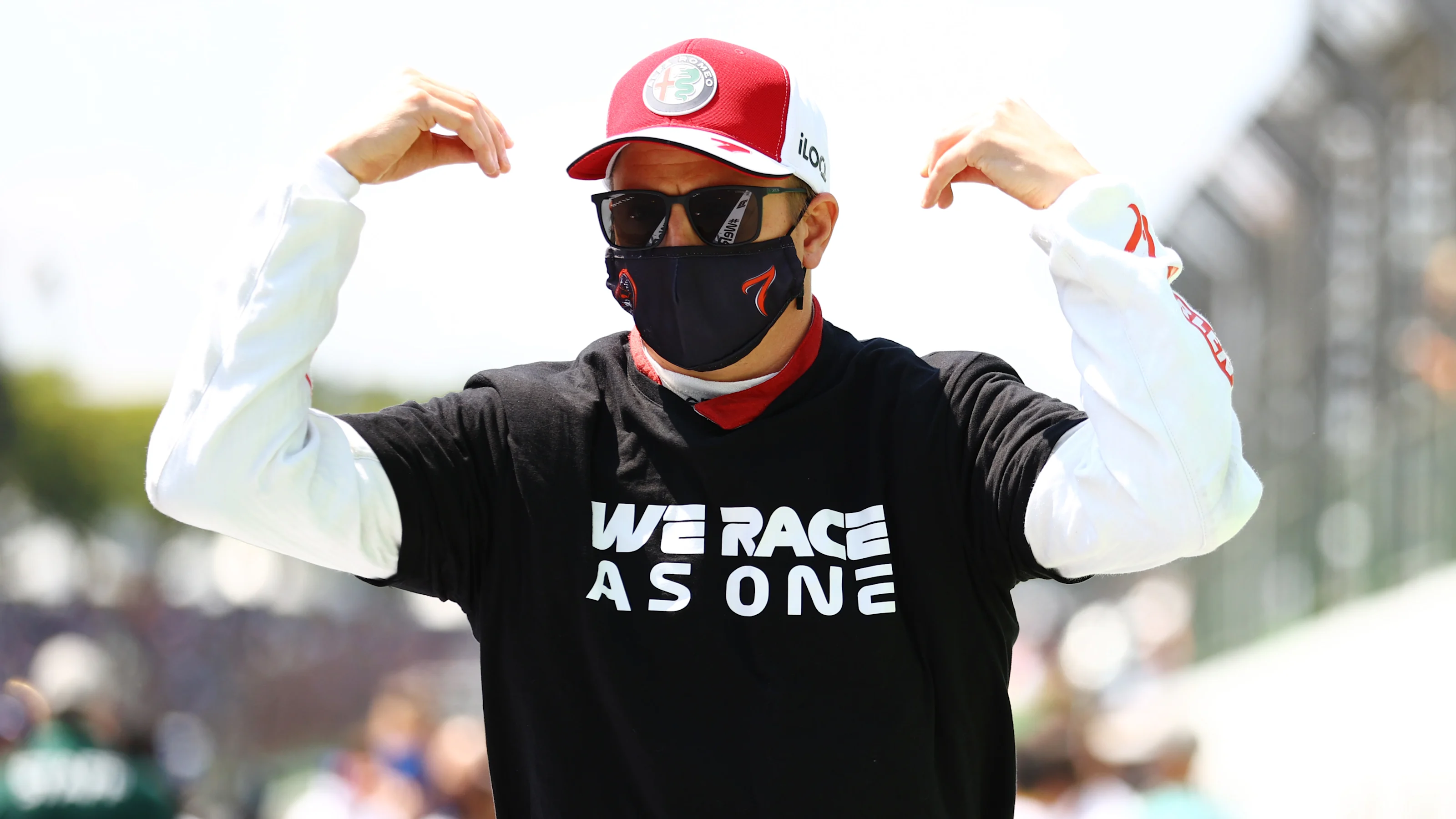 SAO PAULO, BRAZIL - NOVEMBER 14: Kimi Raikkonen of Finland and Alfa Romeo Racing looks on from the