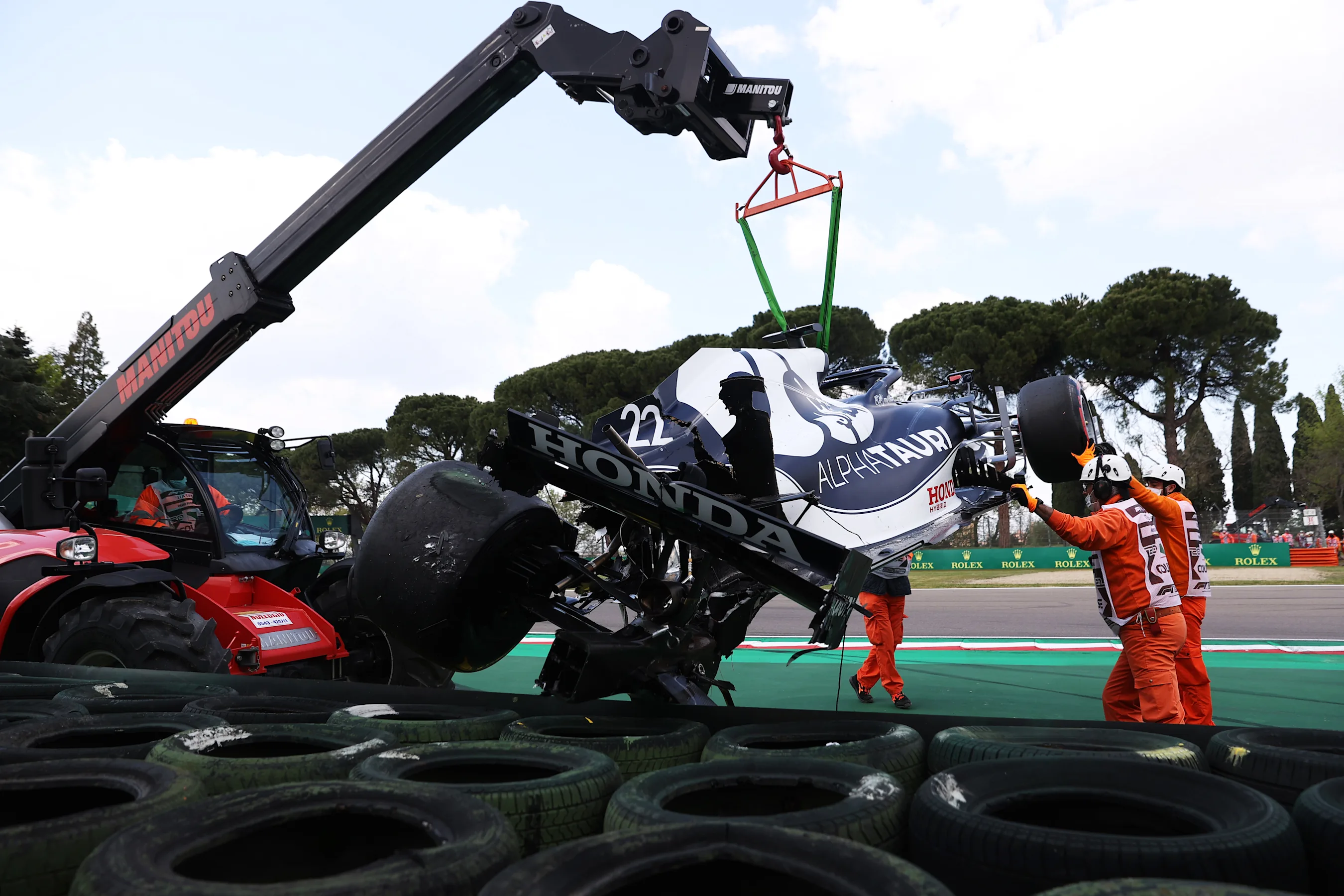 IMOLA, ITALY - APRIL 17: The car of Yuki Tsunoda of Japan and Scuderia AlphaTauri is removed from