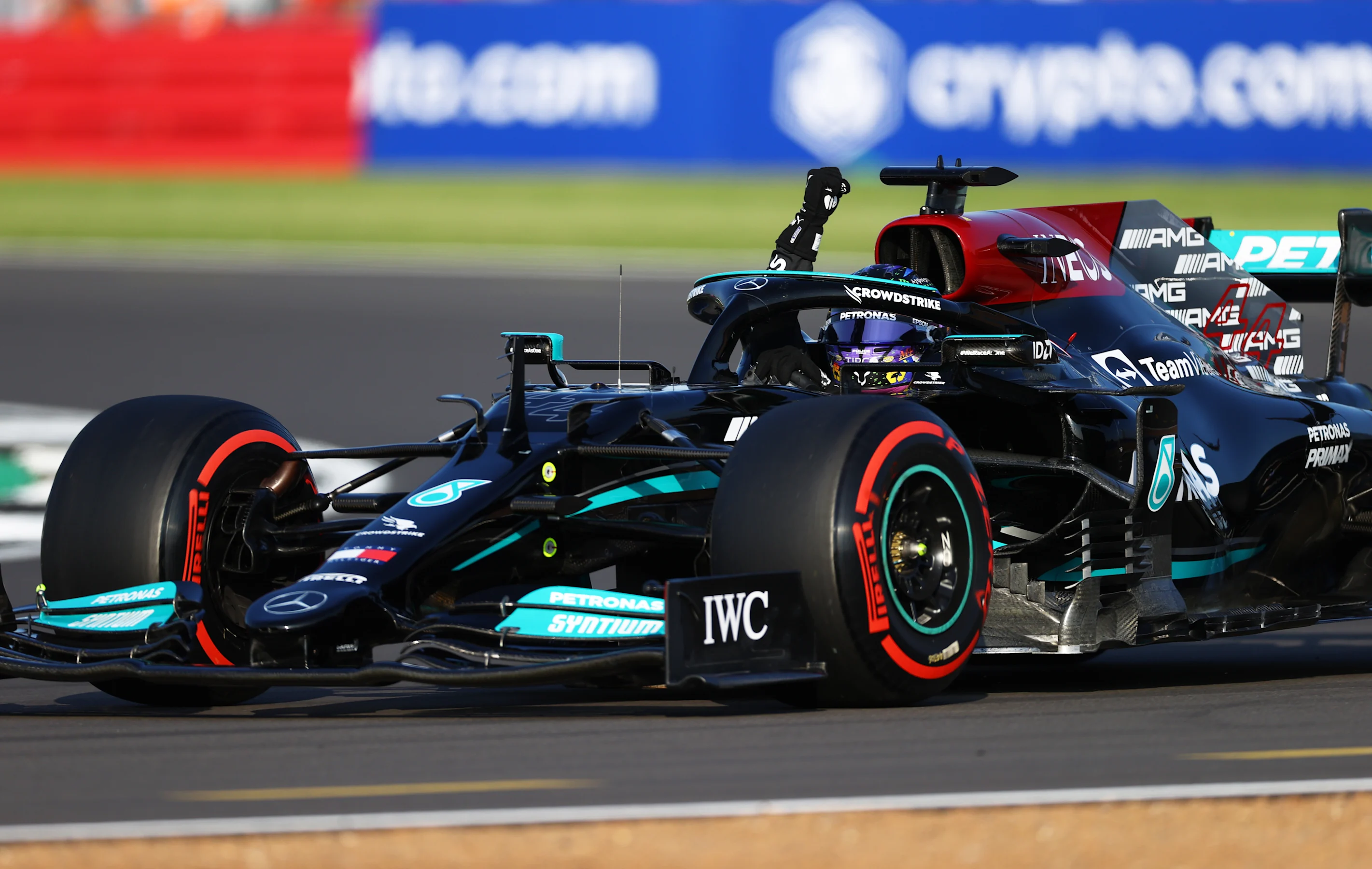 NORTHAMPTON, ENGLAND - JULY 16: Fastest qualifier Lewis Hamilton of Great Britain and Mercedes GP