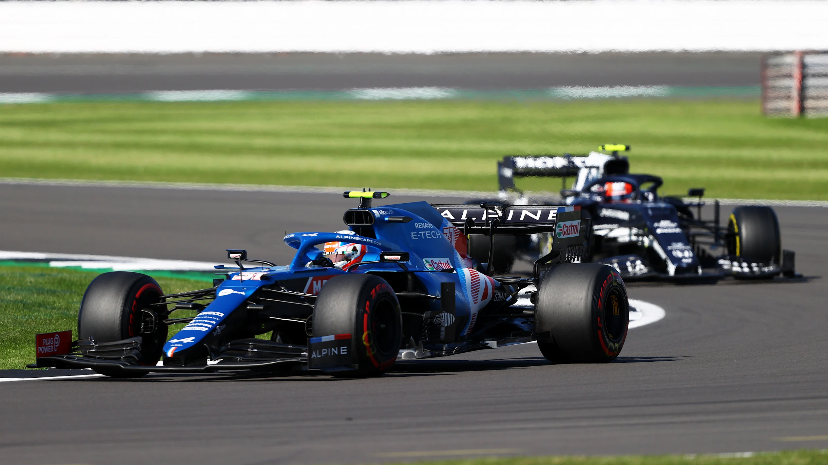NORTHAMPTON, ENGLAND - JULY 17: Esteban Ocon of France driving the (31) Alpine A521 Renault leads
