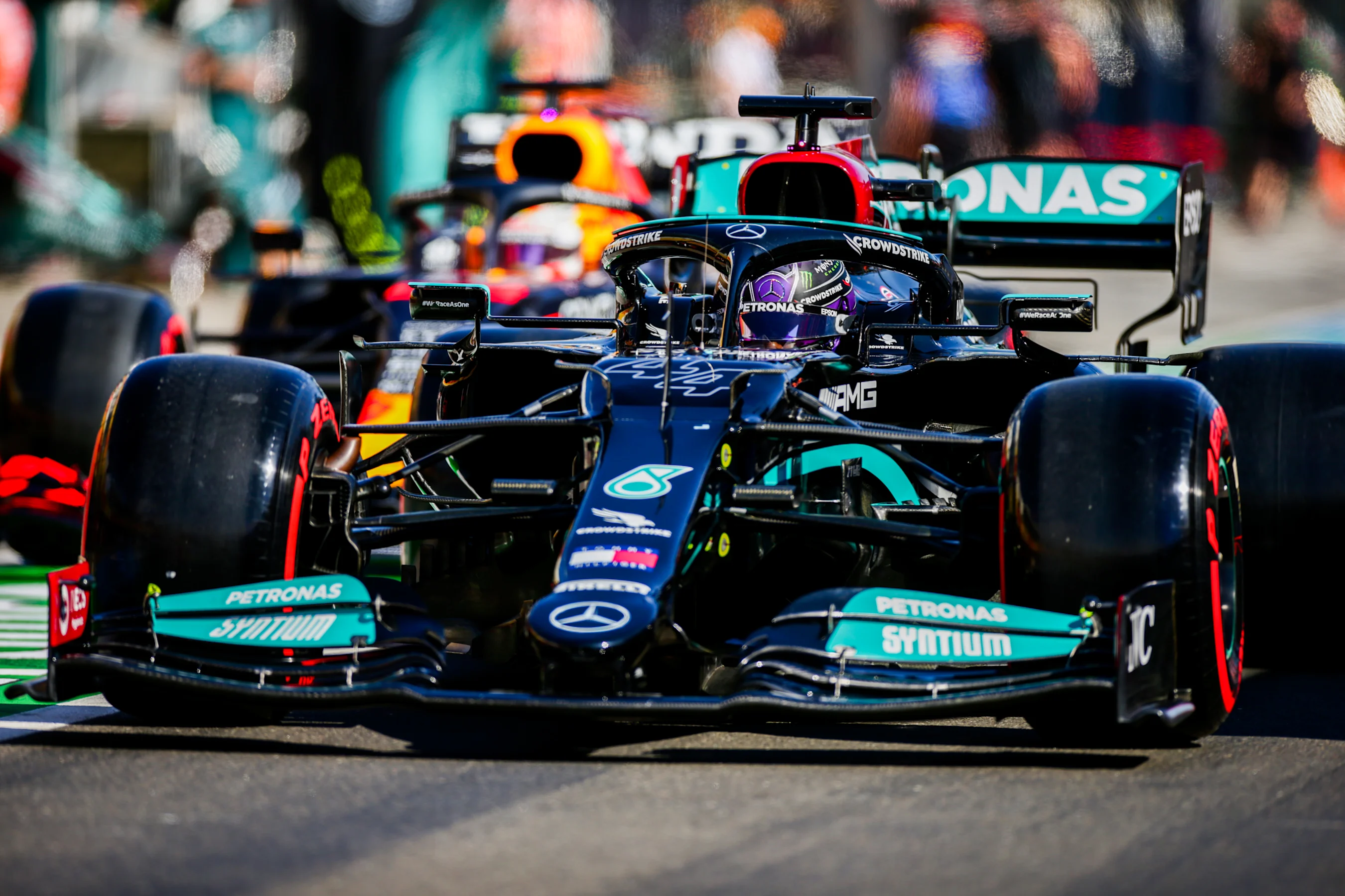 BUDAPEST, HUNGARY - JULY 31: Lewis Hamilton of Mercedes and Great Britain leads Max Verstappen of