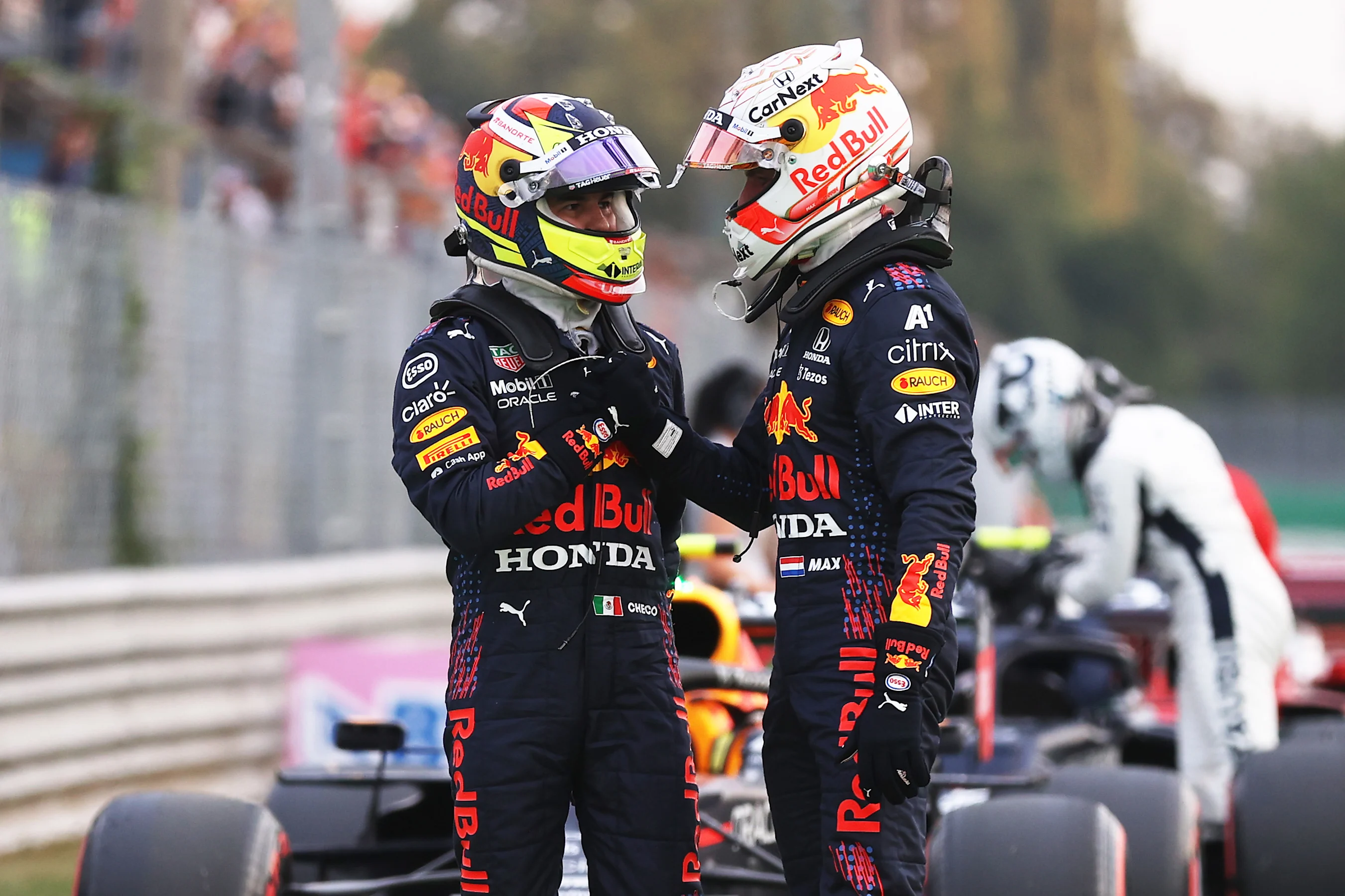 MONZA, ITALY - SEPTEMBER 10: Max Verstappen of Netherlands and Red Bull Racing and Sergio Perez of