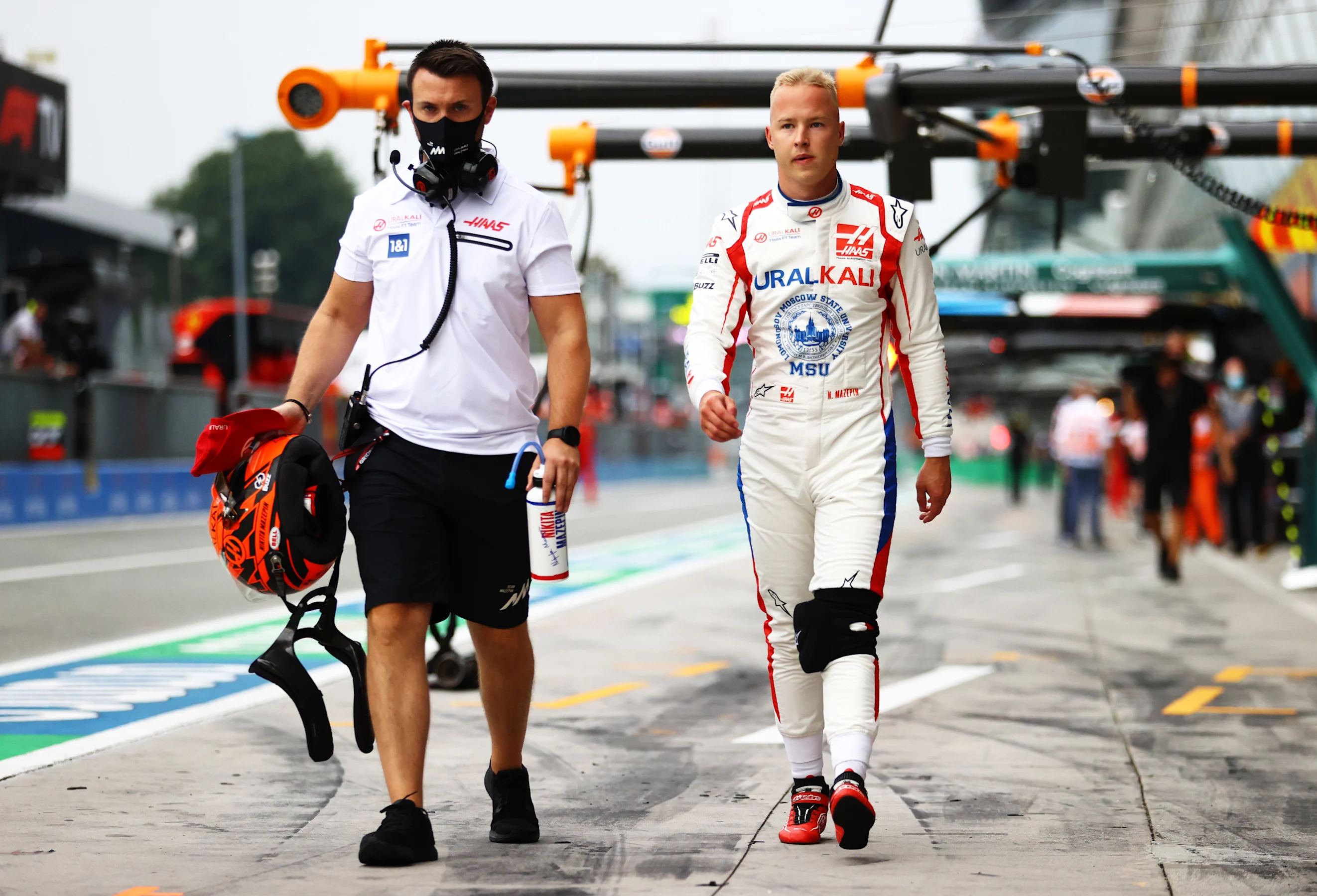 MONZA, ITALY - SEPTEMBER 10: Nikita Mazepin of Russia and Haas F1 walks in the Pitlane during
