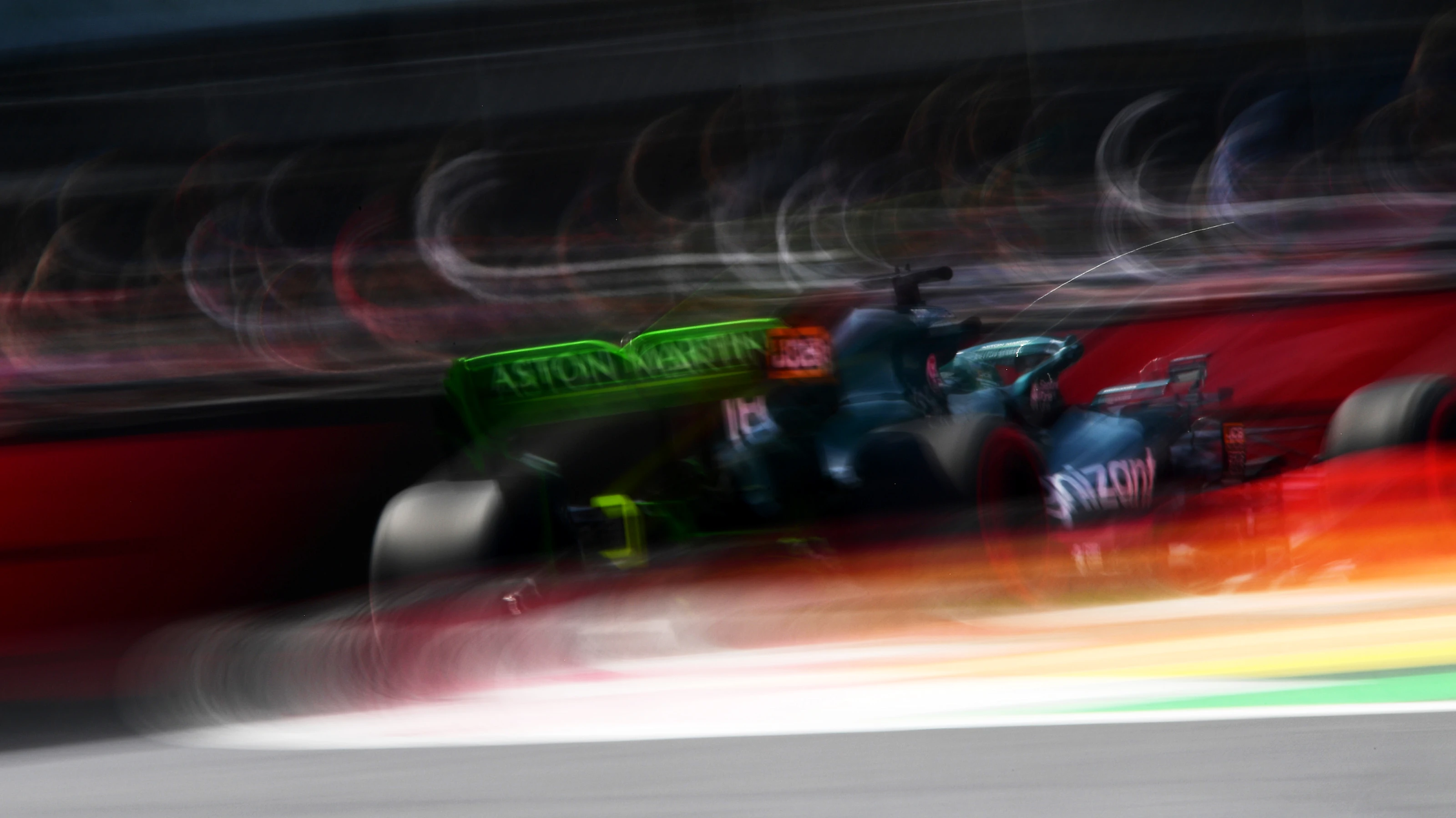MEXICO CITY, MEXICO - NOVEMBER 05: Lance Stroll of Canada driving the (18) Aston Martin AMR21
