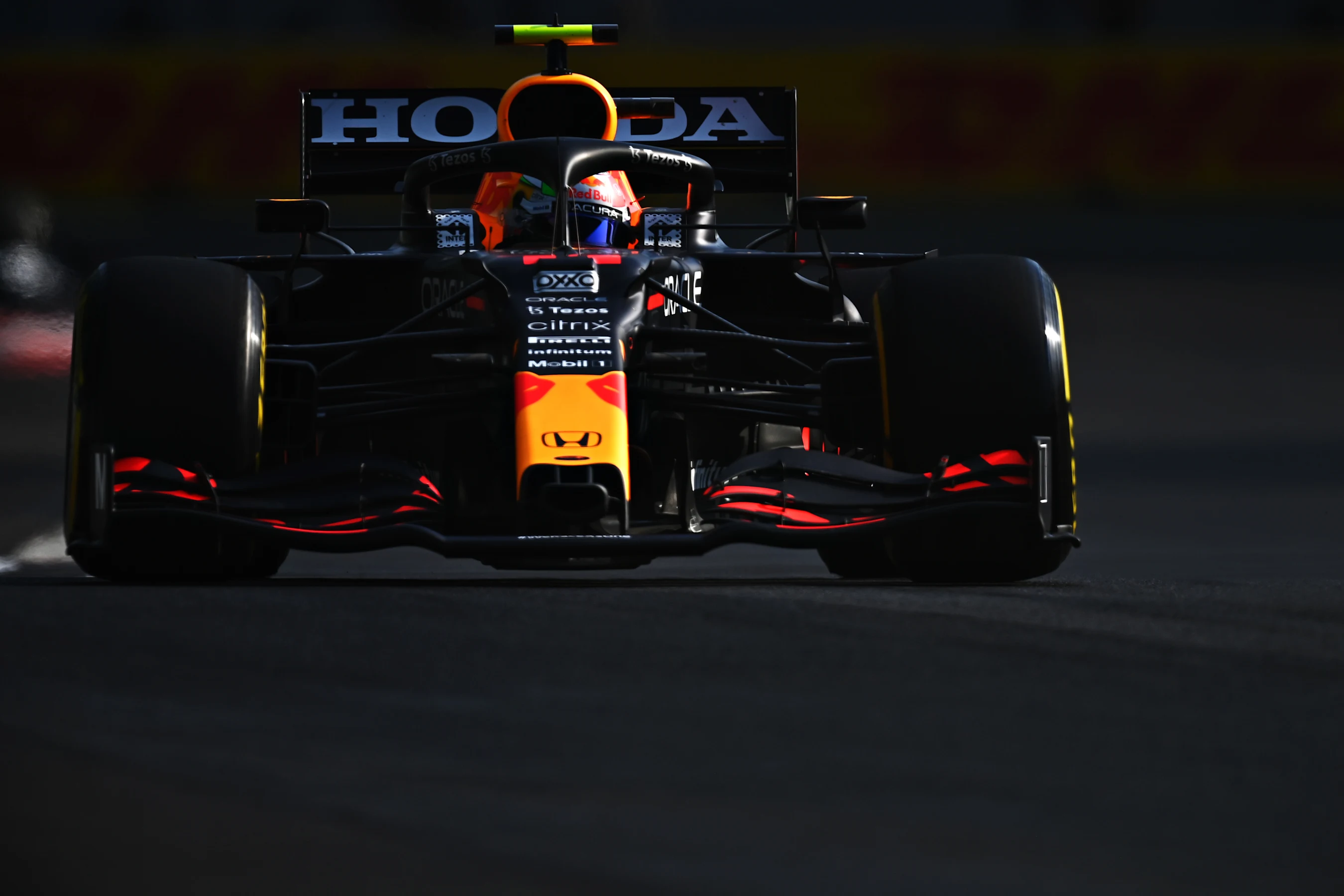 MEXICO CITY, MEXICO - NOVEMBER 05: Sergio Perez of Mexico driving the (11) Red Bull Racing RB16B