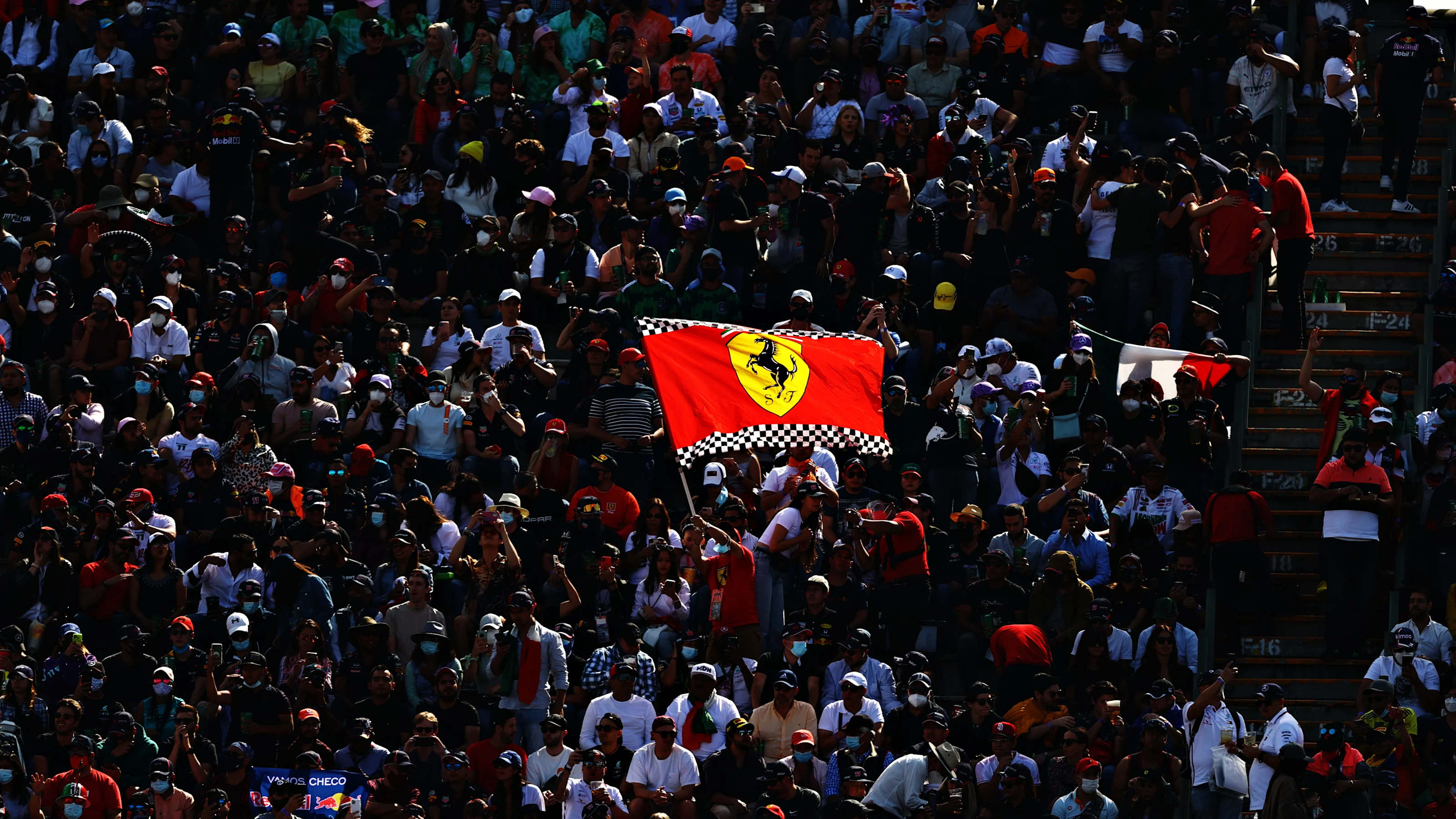 MEXICO CITY, MEXICO - NOVEMBER 06: Ferrari fans show their support during qualifying ahead of the