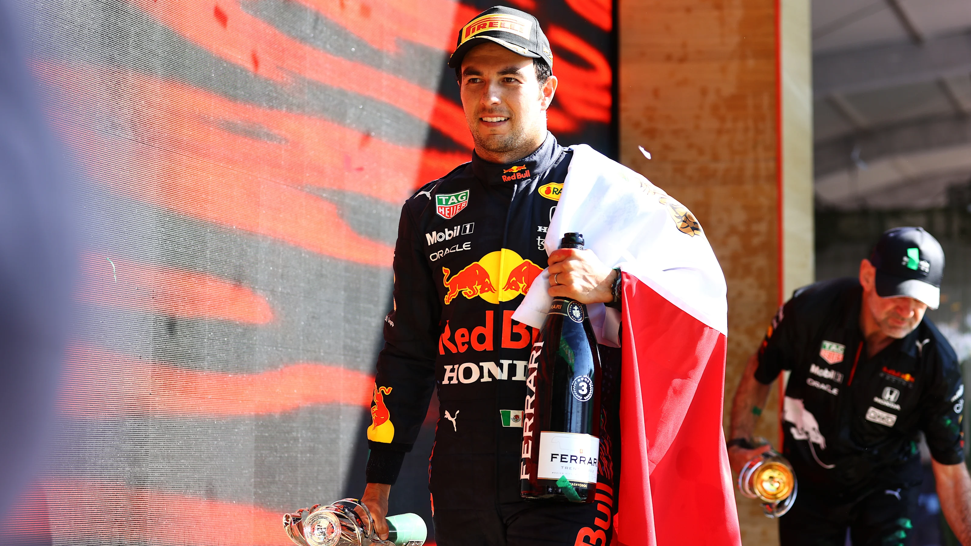 MEXICO CITY, MEXICO - NOVEMBER 07: Third placed Sergio Perez of Mexico and Red Bull Racing