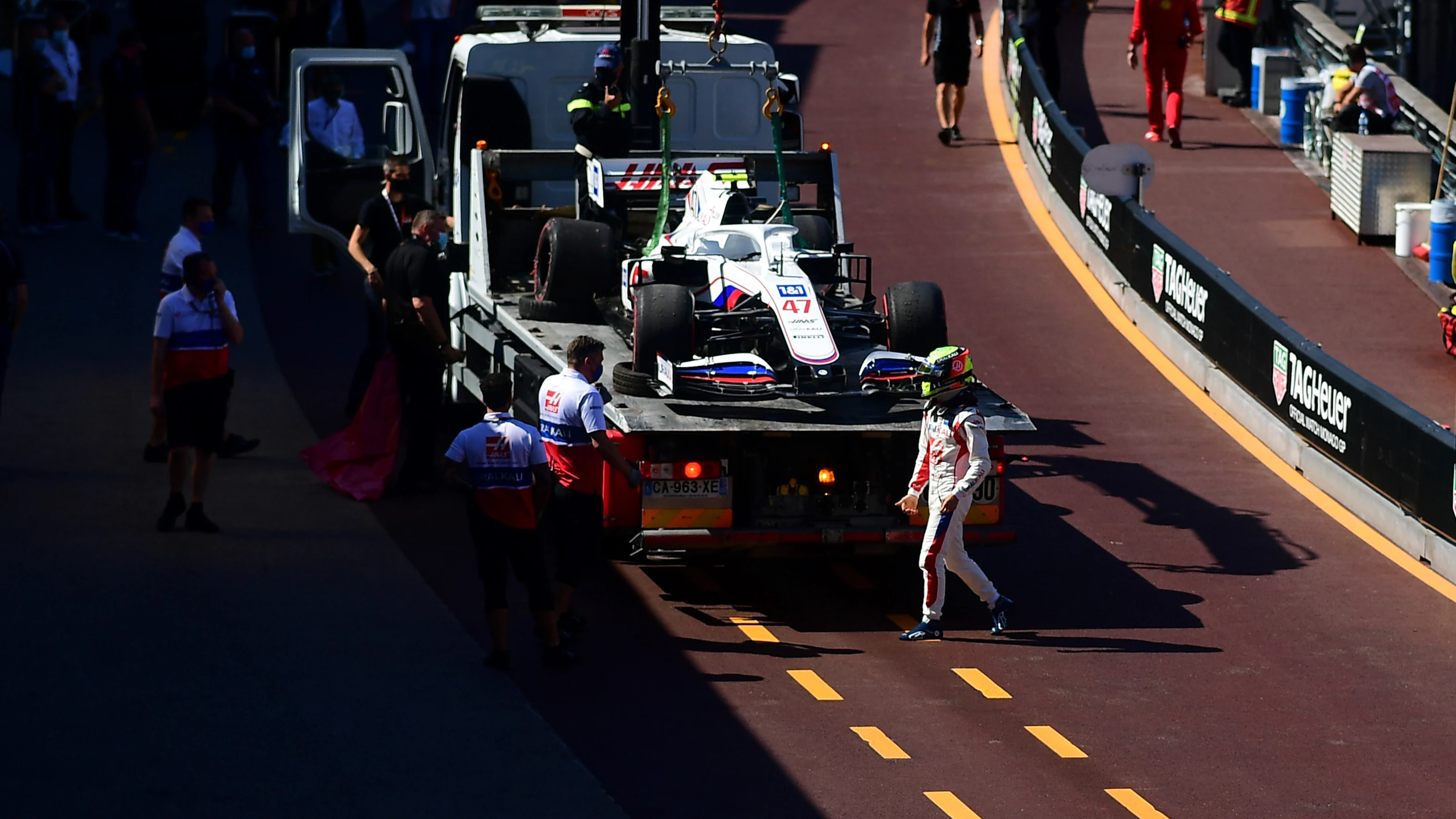 MONTE-CARLO, MONACO - MAY 20: Mick Schumacher of Germany and Haas F1 walks past his car on a tow