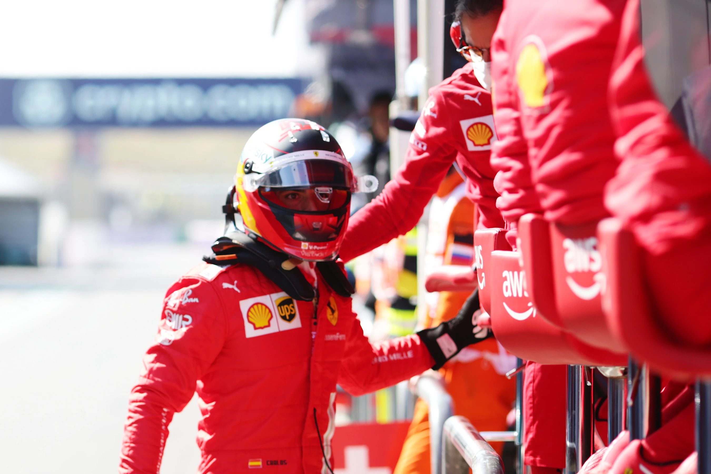ZANDVOORT, NETHERLANDS - SEPTEMBER 04: Carlos Sainz of Spain and Ferrari talks with the Ferrari