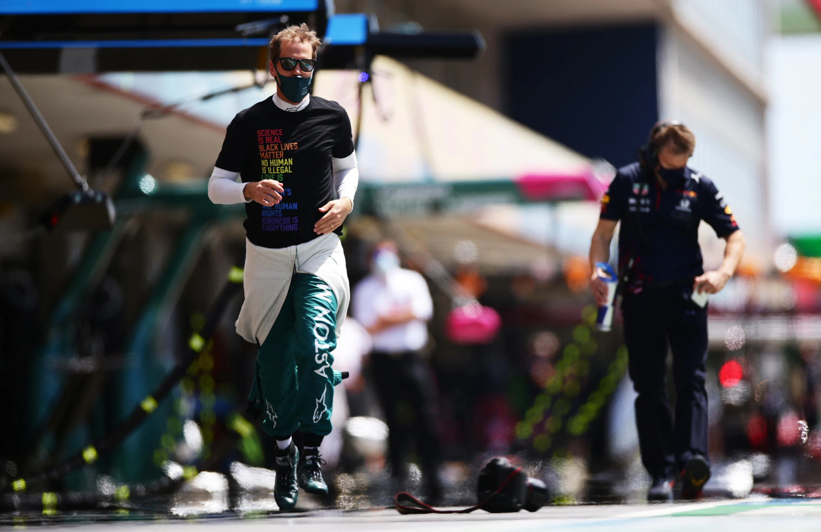 PORTIMAO, PORTUGAL - MAY 02: Sebastian Vettel of Germany and Aston Martin F1 Team runs to the grid