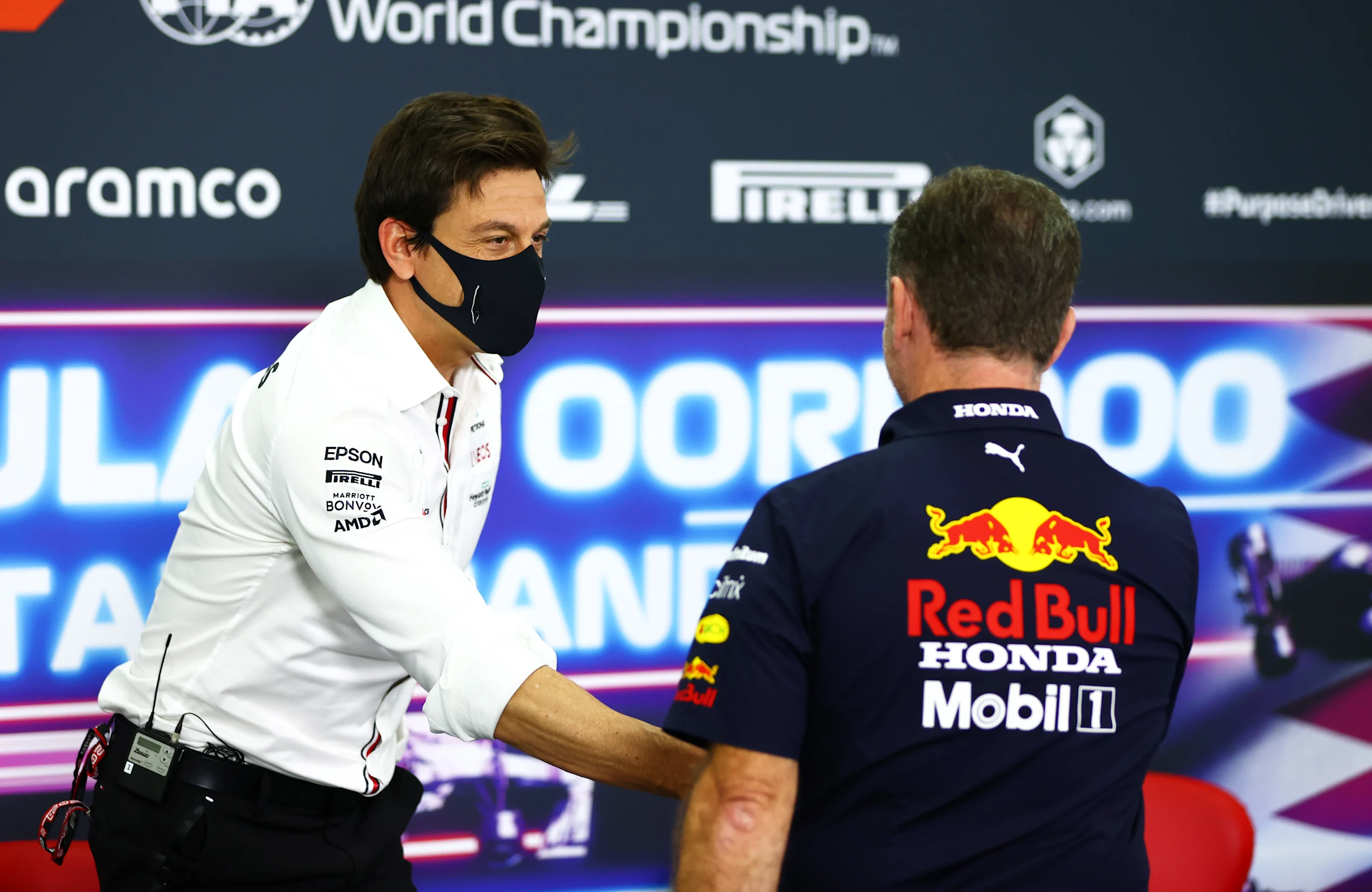 DOHA, QATAR - NOVEMBER 19: Mercedes GP Executive Director Toto Wolff and Red Bull Racing Team