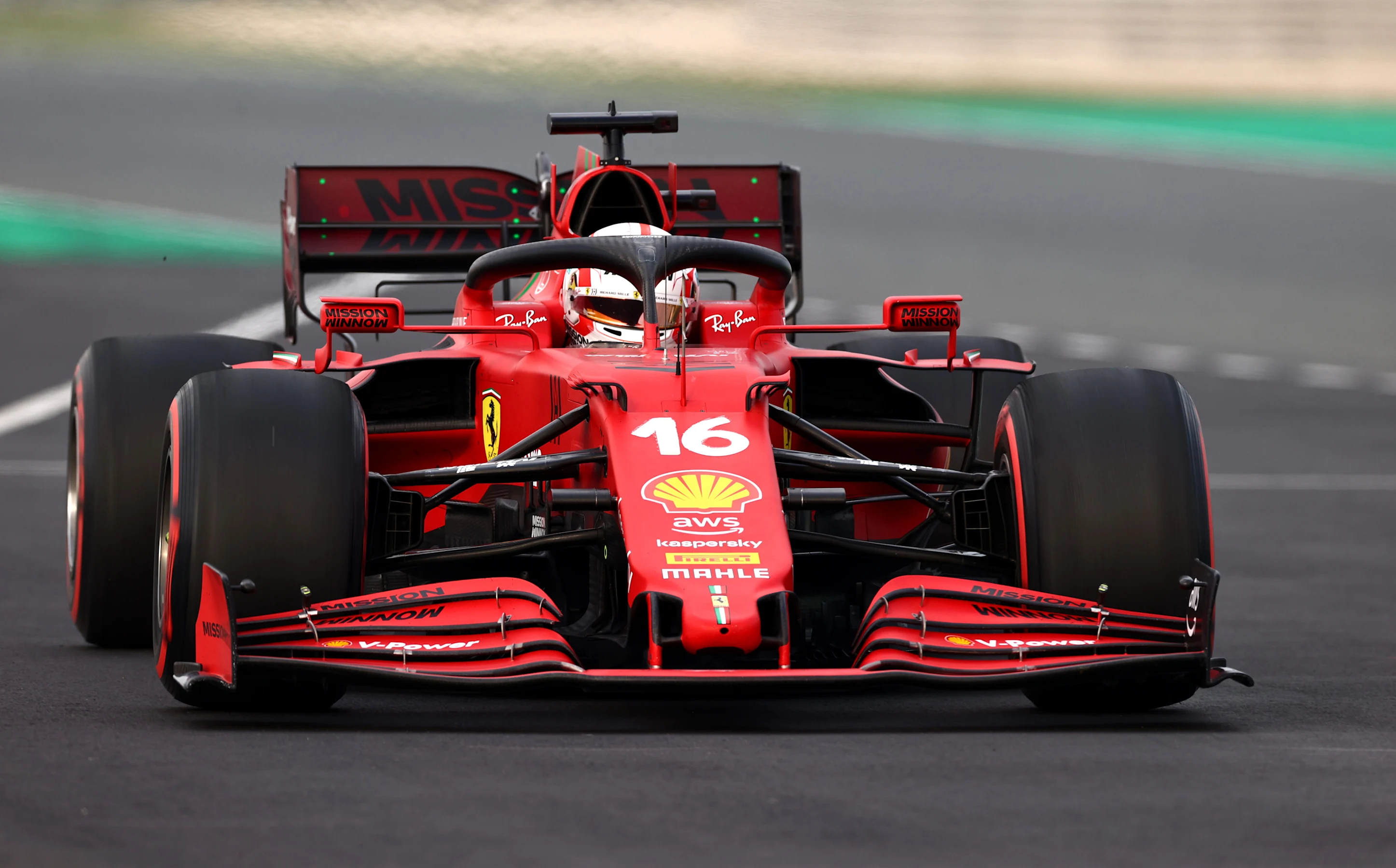 DOHA, QATAR - NOVEMBER 19: Charles Leclerc of Monaco driving the (16) Scuderia Ferrari SF21 during