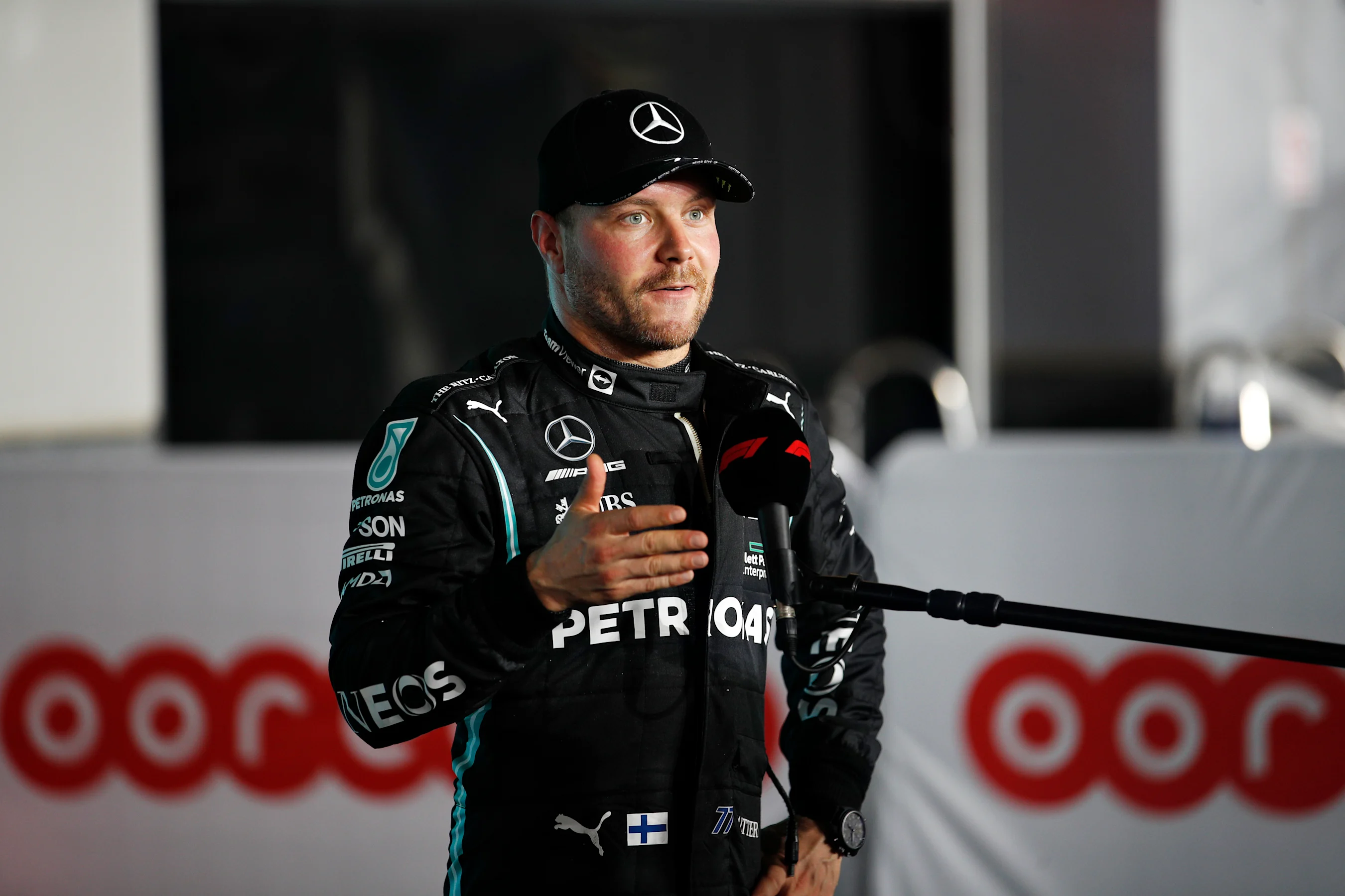 DOHA, QATAR - NOVEMBER 20: Third place qualifier Valtteri Bottas of Finland and Mercedes GP talks