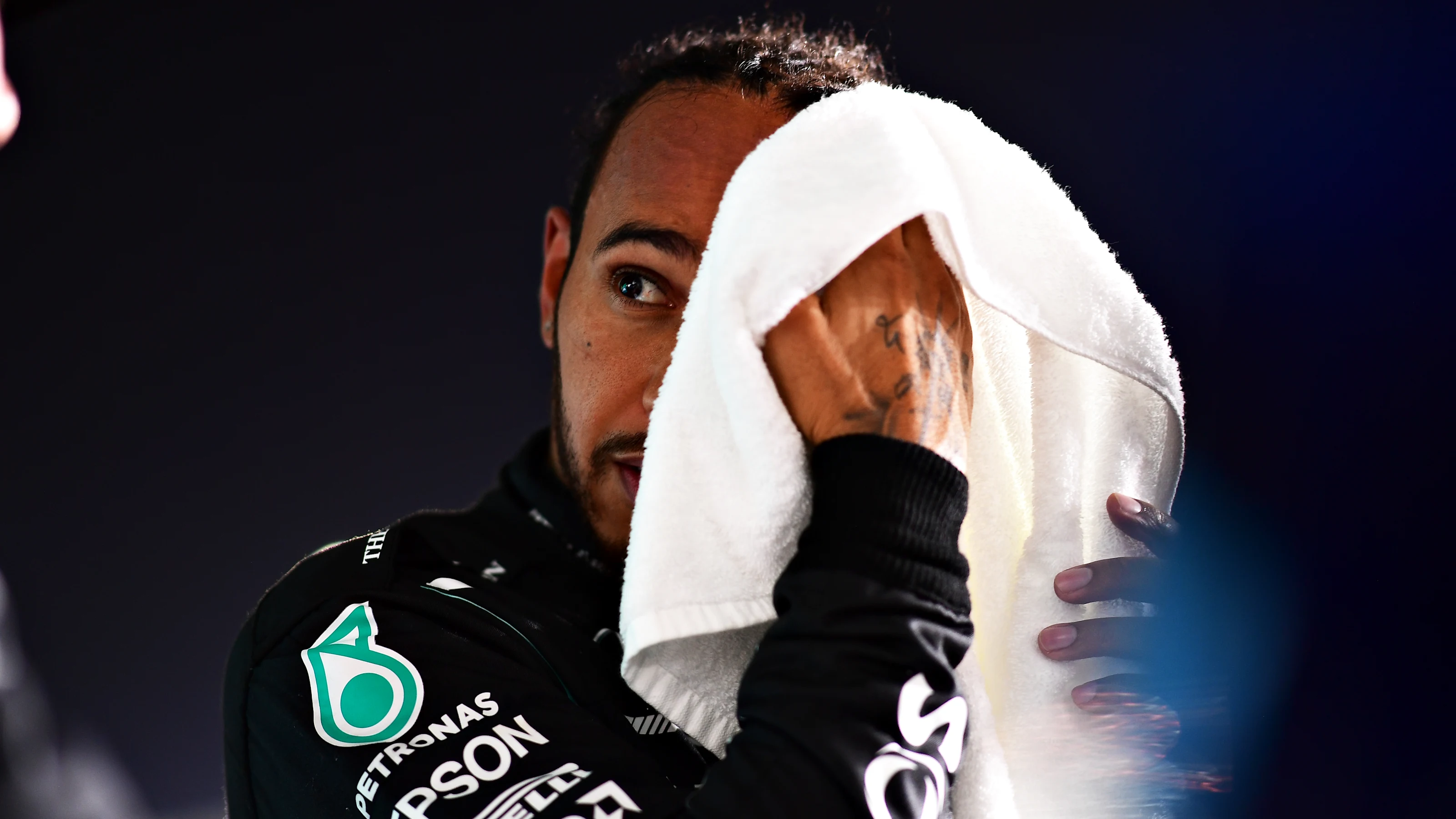DOHA, QATAR - NOVEMBER 20: Pole position qualifier Lewis Hamilton of Great Britain and Mercedes GP