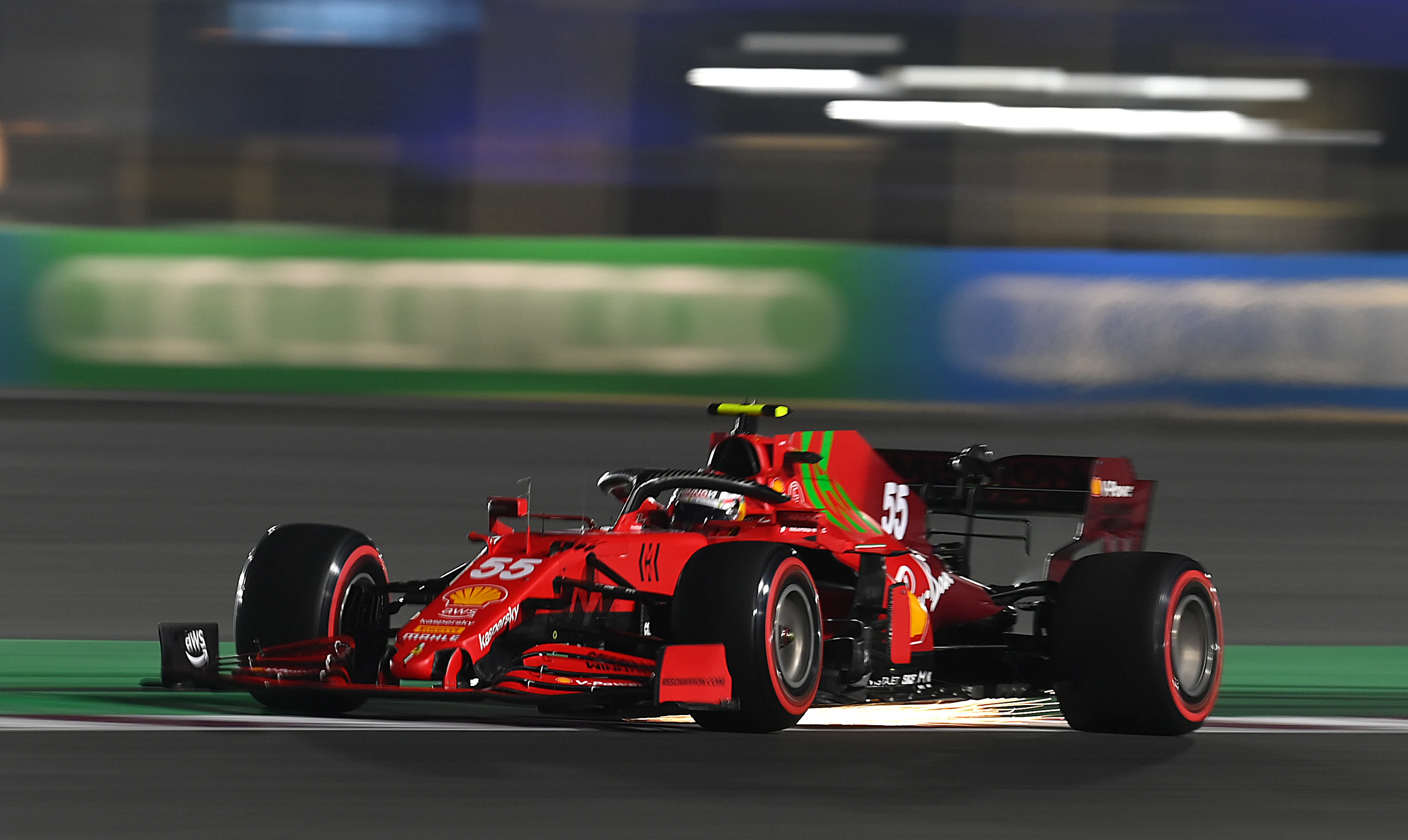 DOHA, QATAR - NOVEMBER 20: Carlos Sainz of Spain driving the (55) Scuderia Ferrari SF21 during