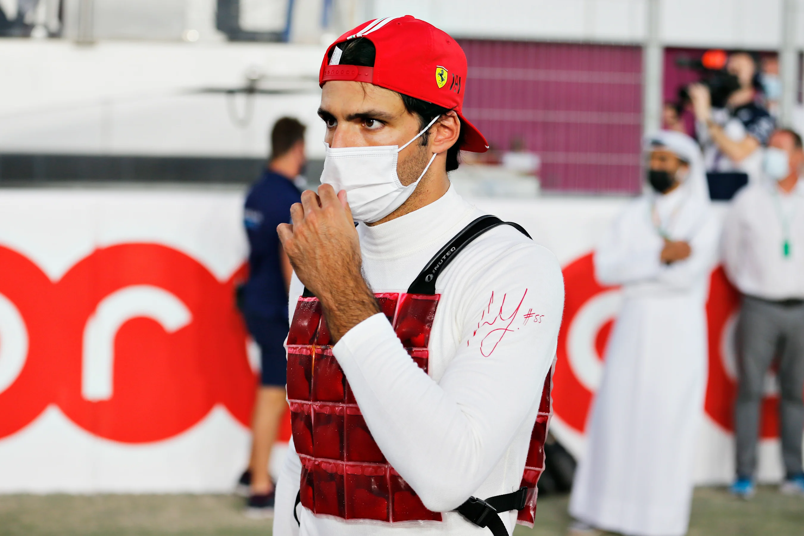 DOHA, QATAR - NOVEMBER 21: Carlos Sainz of Spain and Ferrari looks on from the grid during the F1