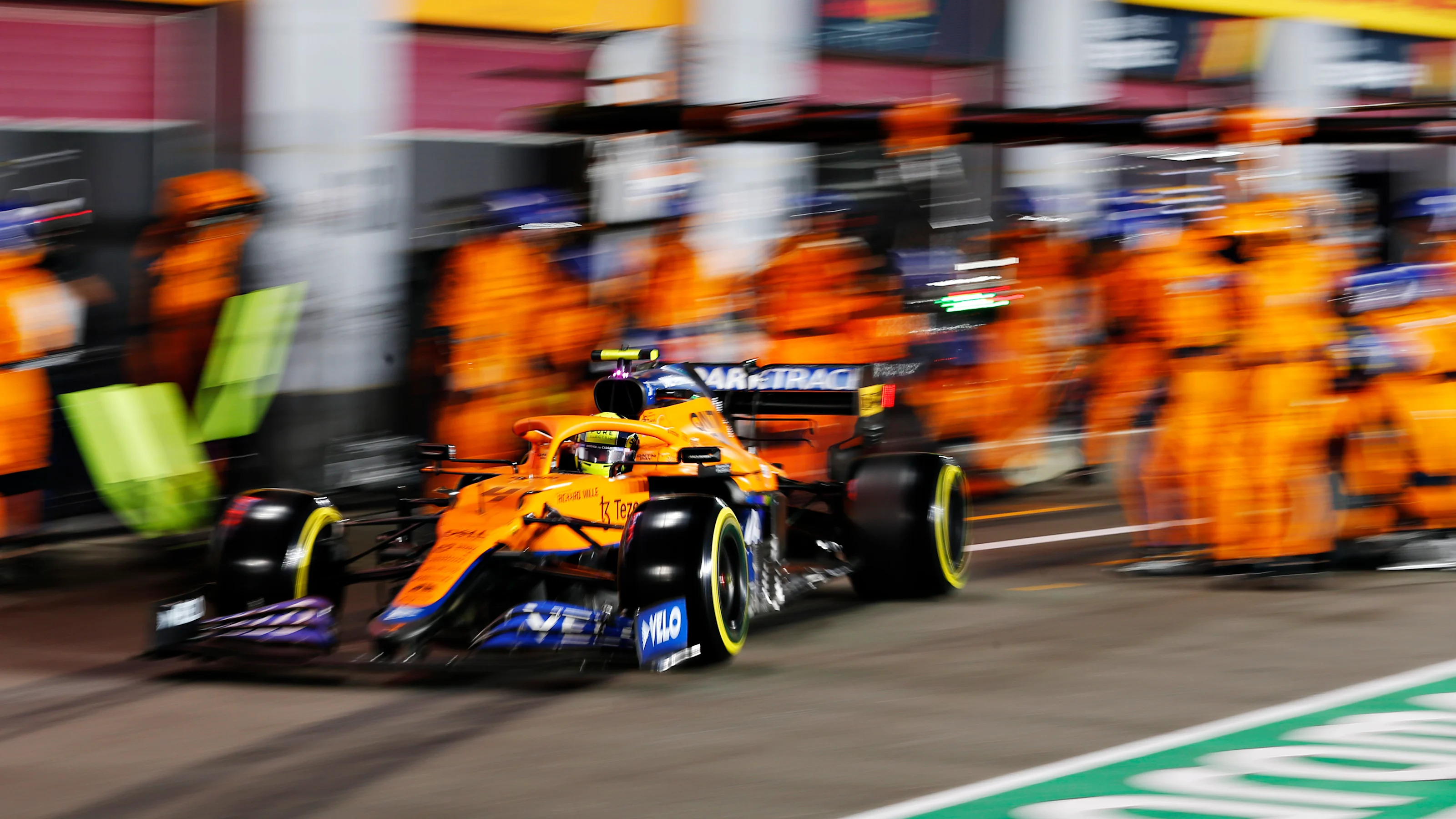 DOHA, QATAR - NOVEMBER 21: Lando Norris of Great Britain driving the (4) McLaren F1 Team MCL35M