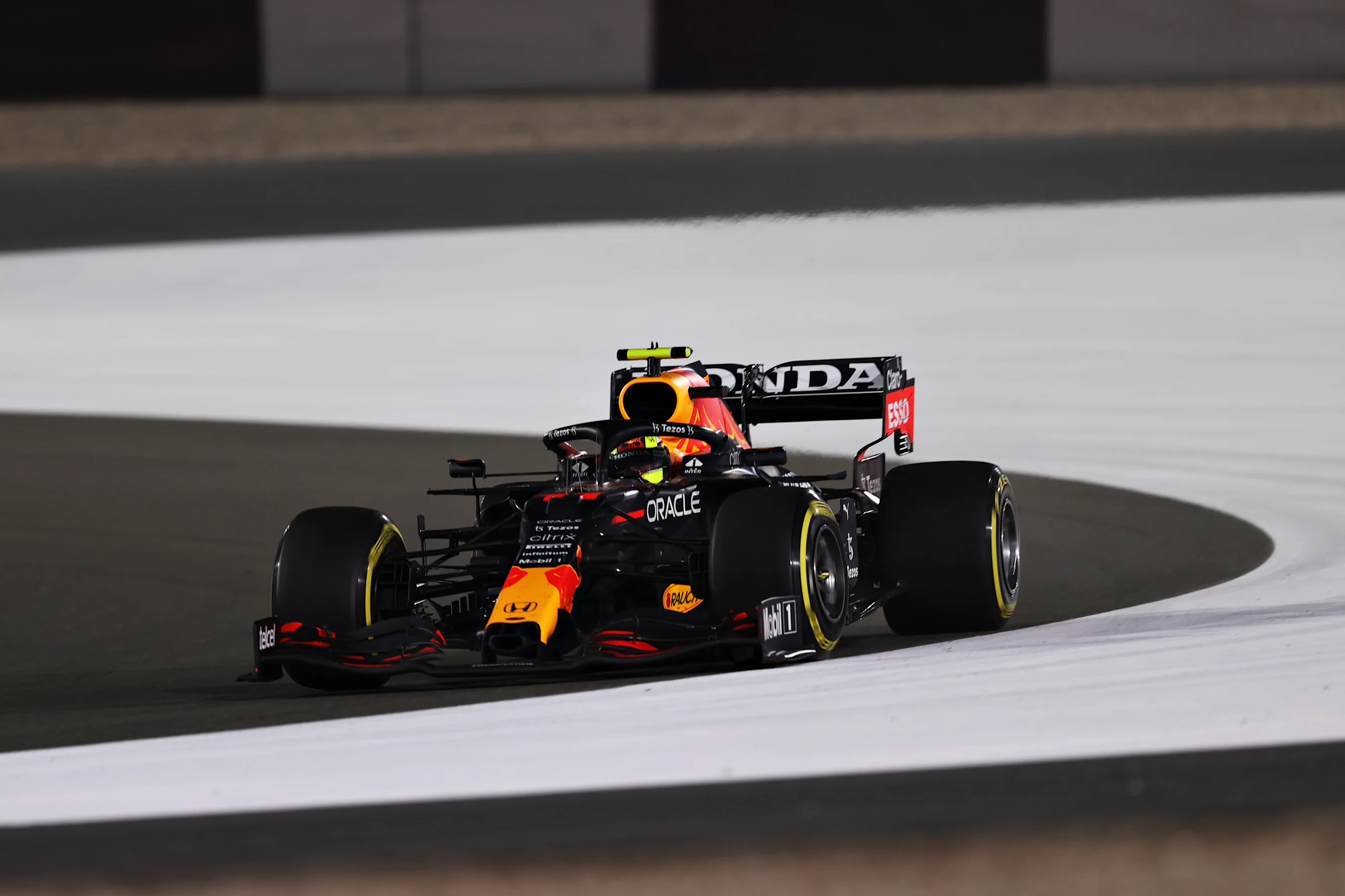 DOHA, QATAR - NOVEMBER 21: Sergio Perez of Mexico driving the (11) Red Bull Racing RB16B Honda