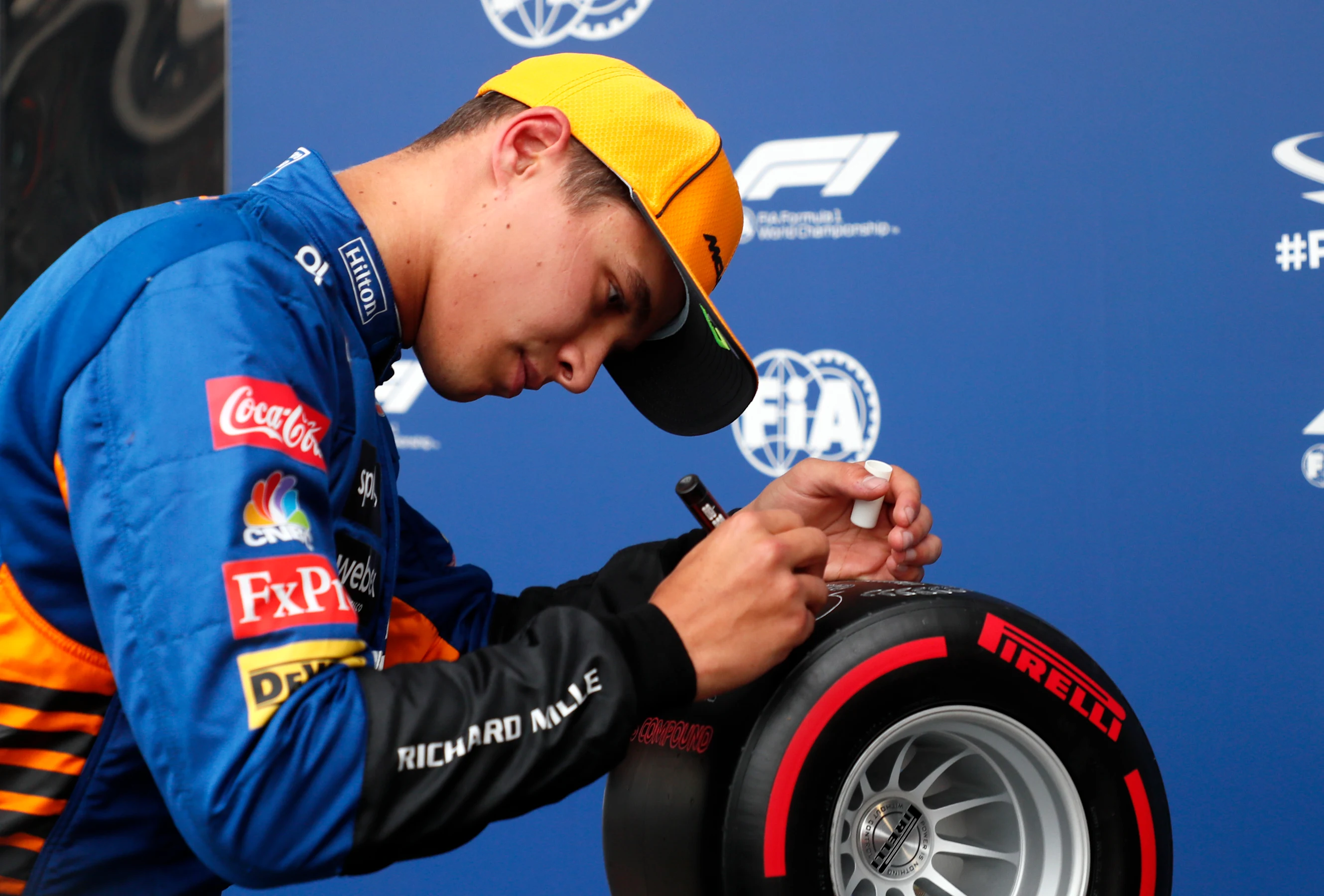 SOCHI, RUSSIA - SEPTEMBER 25: Pole position qualifier Lando Norris of Great Britain and McLaren F1