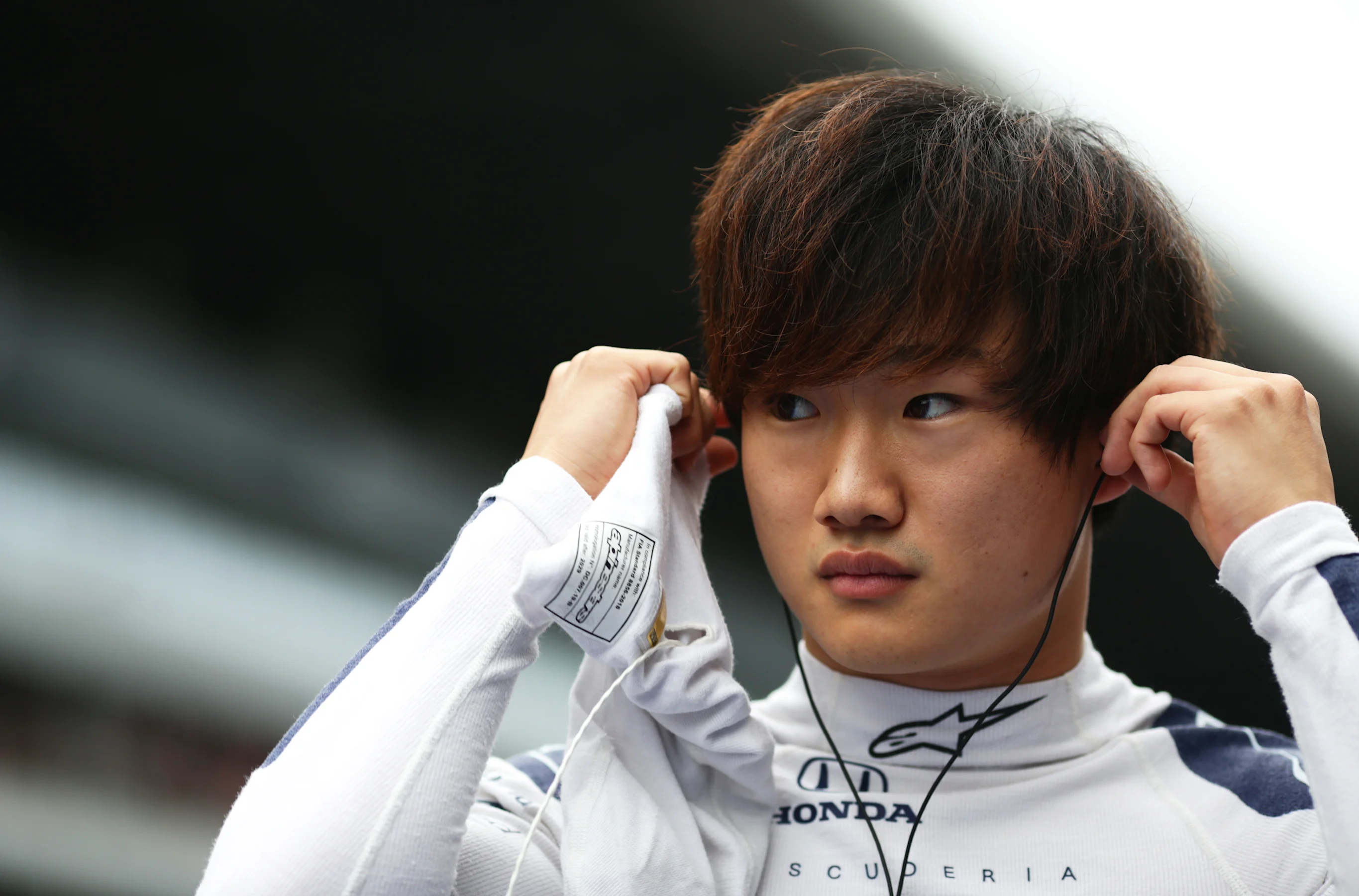 SOCHI, RUSSIA - SEPTEMBER 26: Yuki Tsunoda of Japan and Scuderia AlphaTauri prepares to drive on