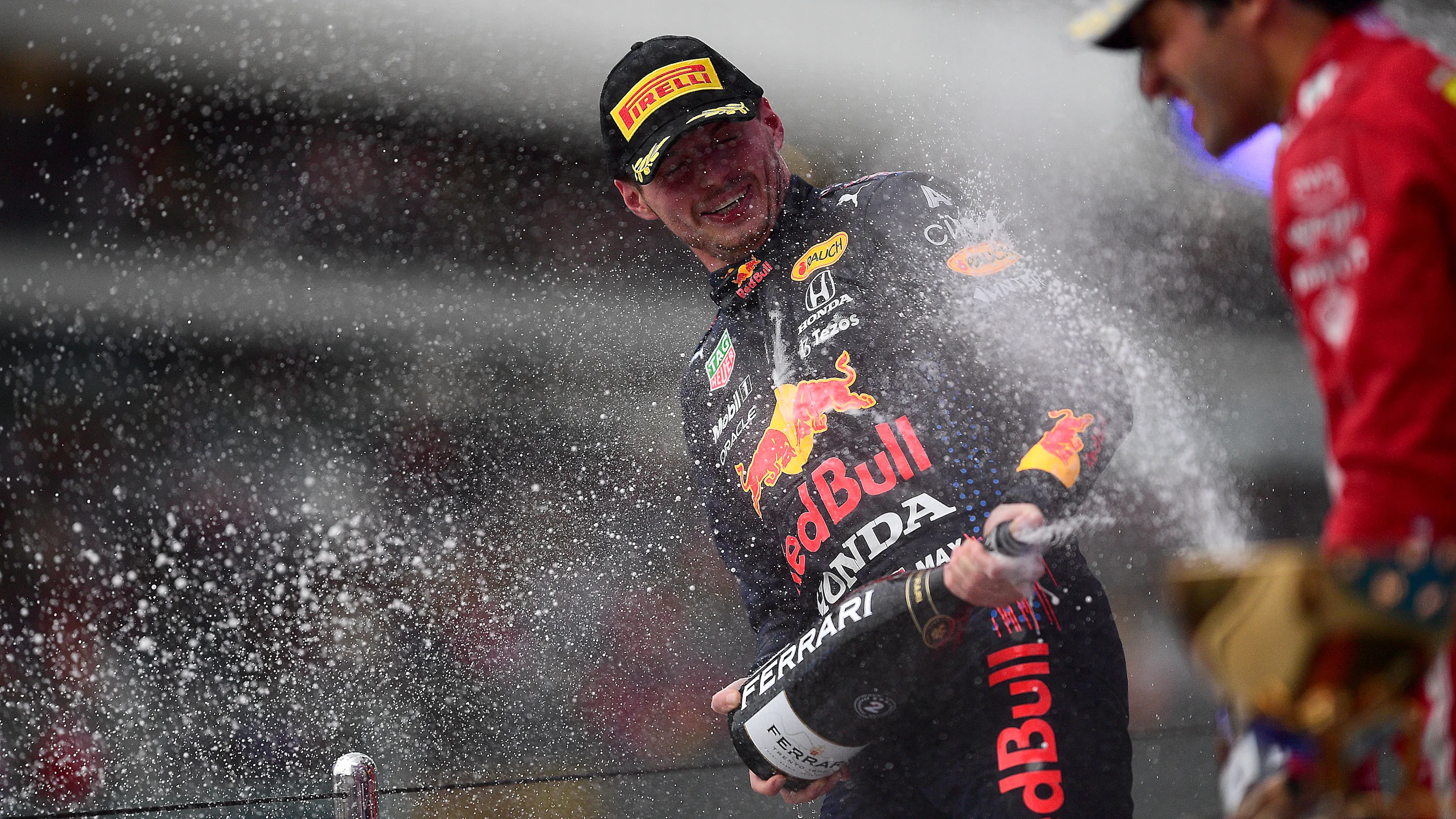 SOCHI, RUSSIA - SEPTEMBER 26: Second placed Max Verstappen of Netherlands and Red Bull Racing