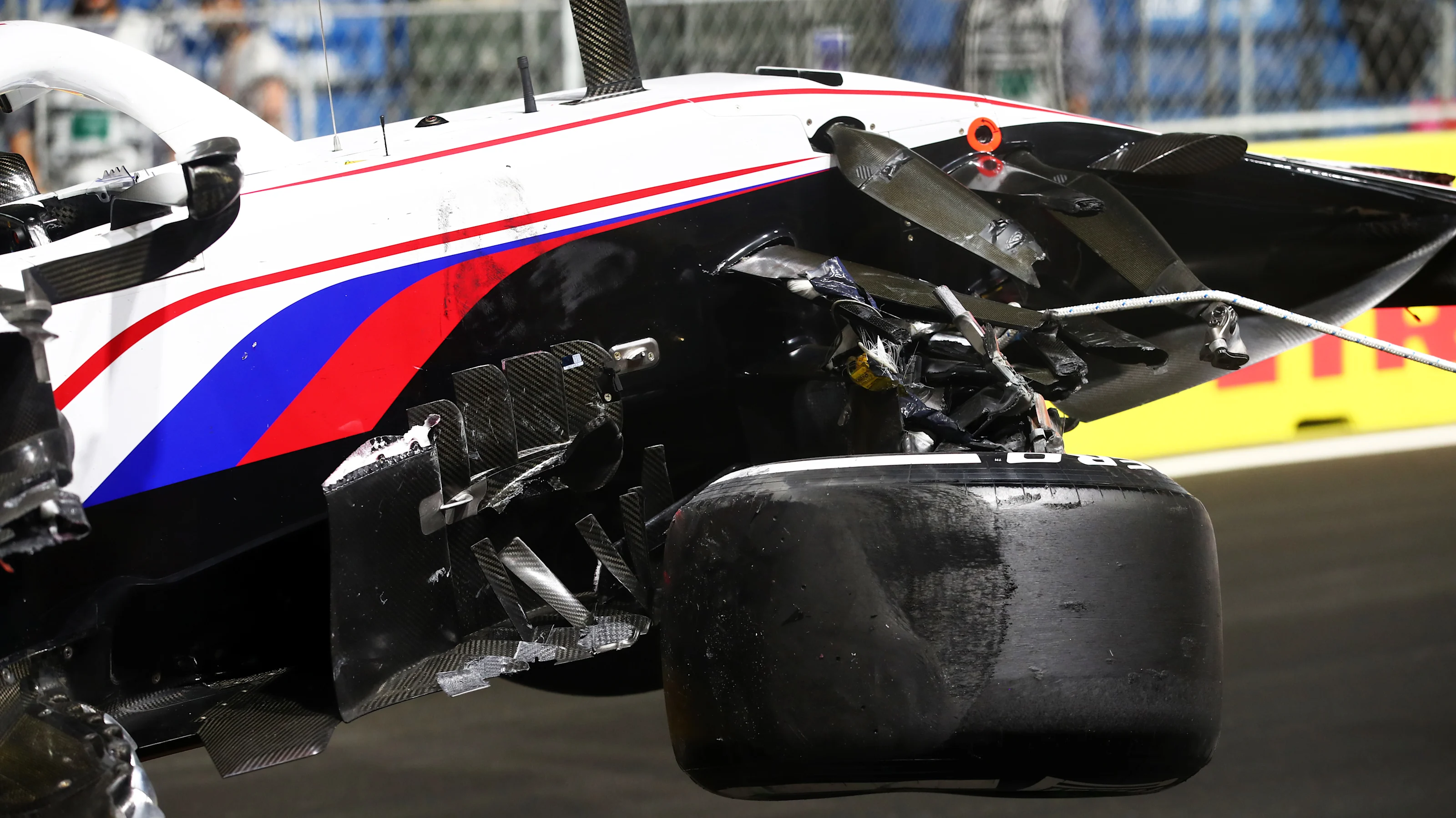 JEDDAH, SAUDI ARABIA - DECEMBER 05: The car of Nikita Mazepin of Russia and Haas F1 is removed from