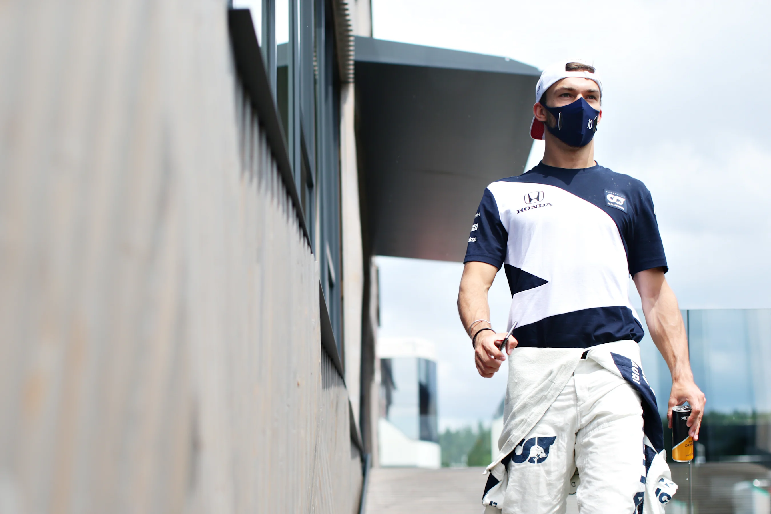 SPIELBERG, AUSTRIA - JUNE 25: Pierre Gasly of France and Scuderia AlphaTauri walks in the Paddock