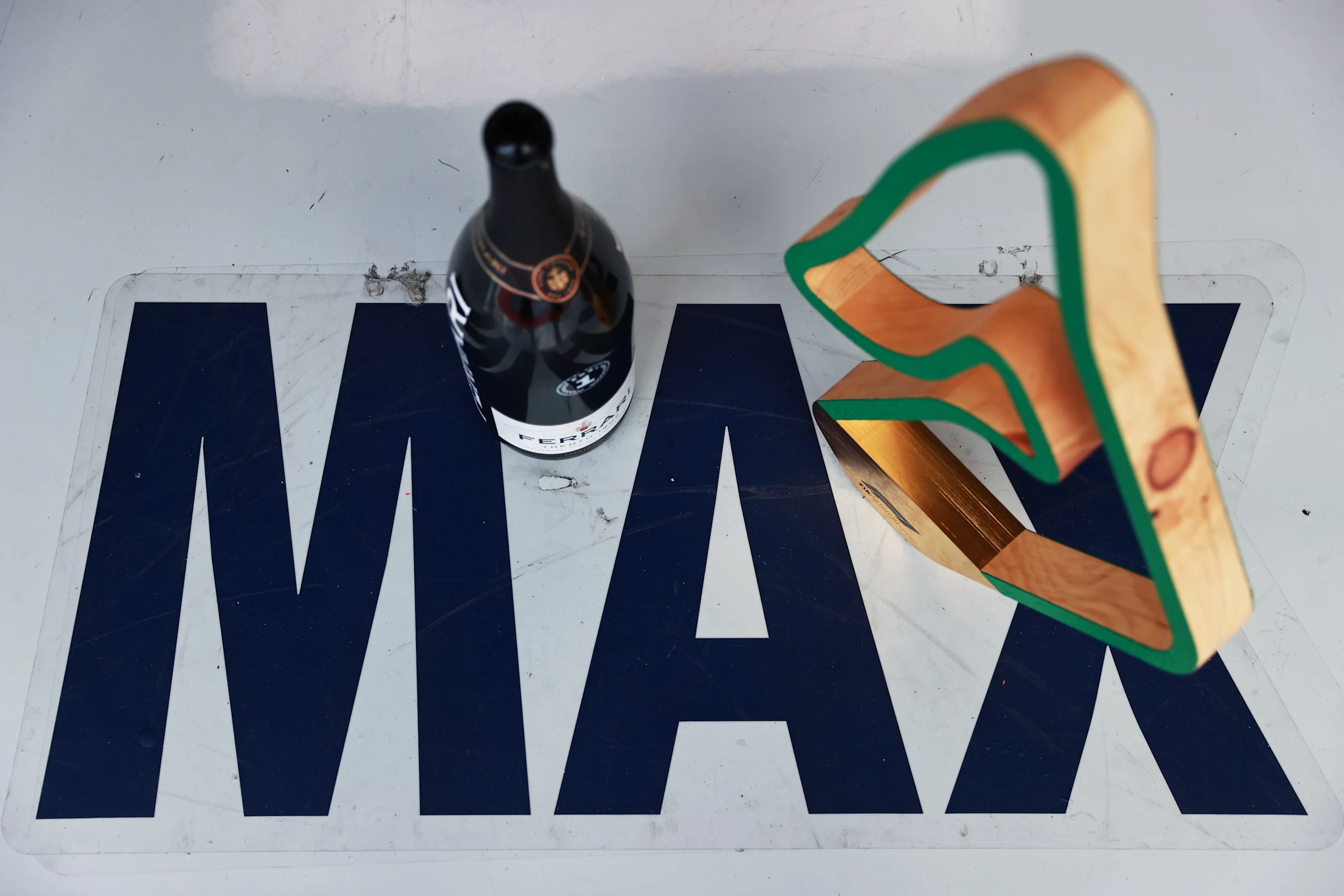 SPIELBERG, AUSTRIA - JUNE 27: The race winners trophies and sparkling wine of Max Verstappen of