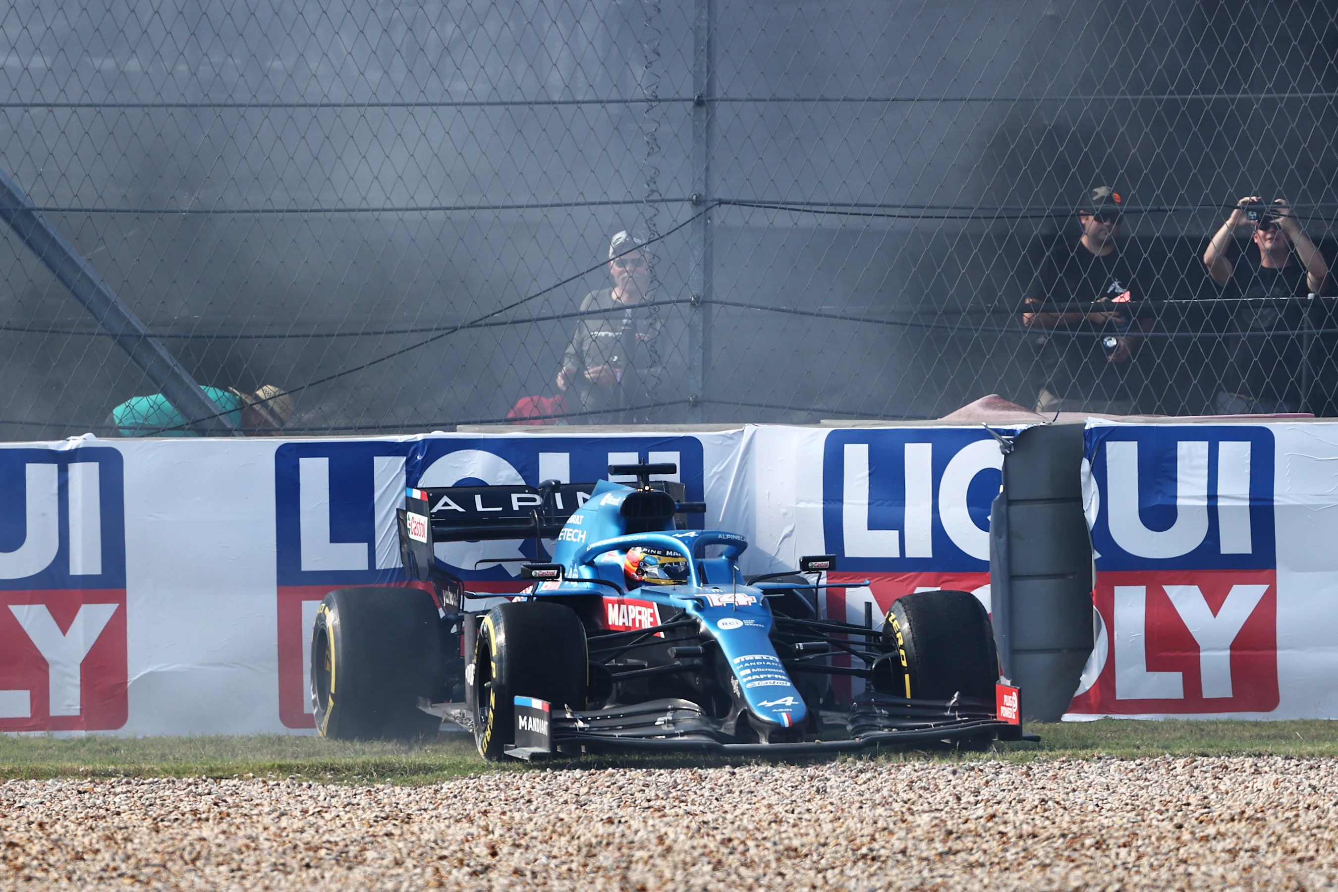 AUSTIN, TEXAS - OCTOBER 22: Fernando Alonso of Spain driving the (14) Alpine A521 Renault crashes