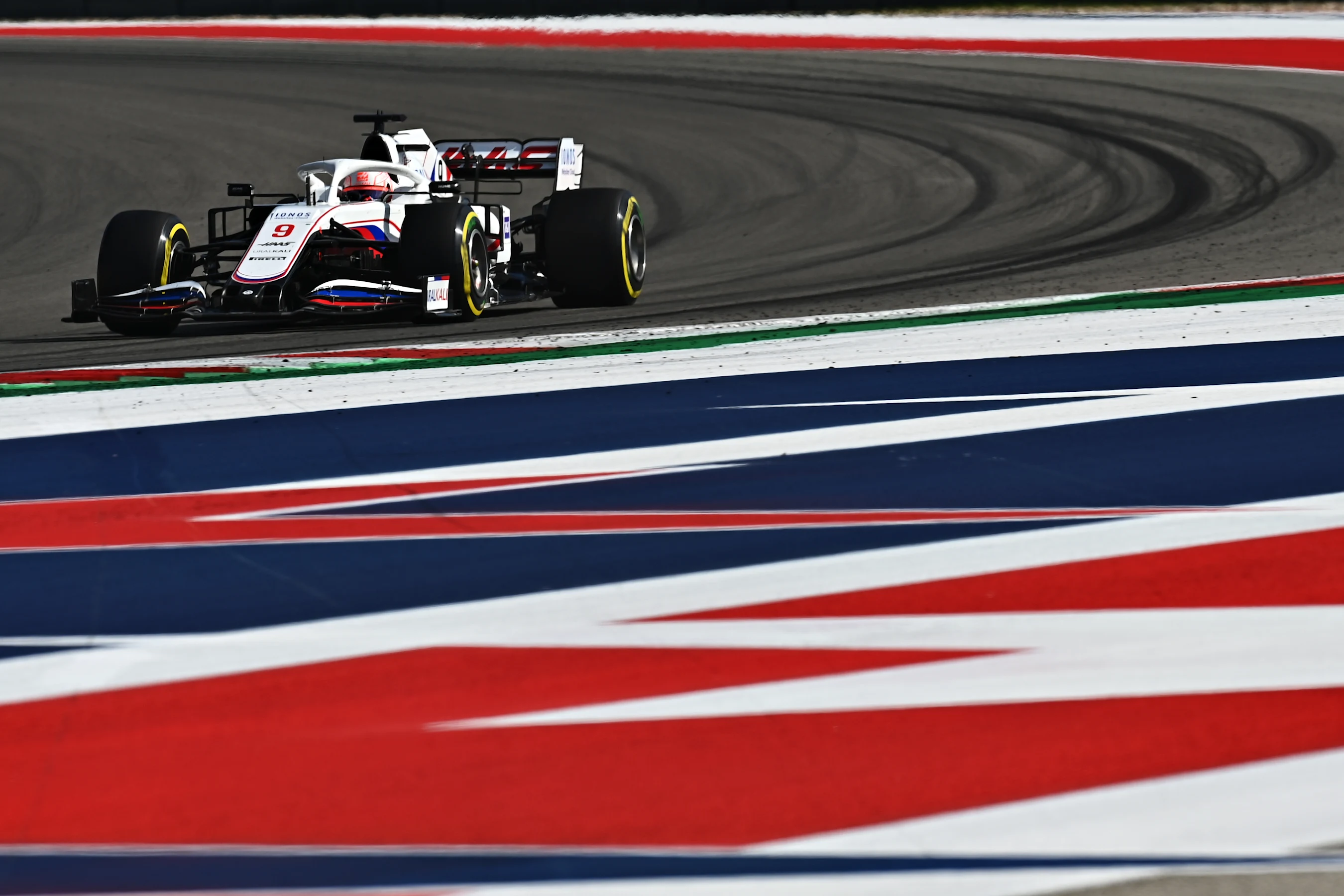 AUSTIN, TEXAS - OCTOBER 24: Nikita Mazepin of Russia driving the (9) Haas F1 Team VF-21 Ferrari