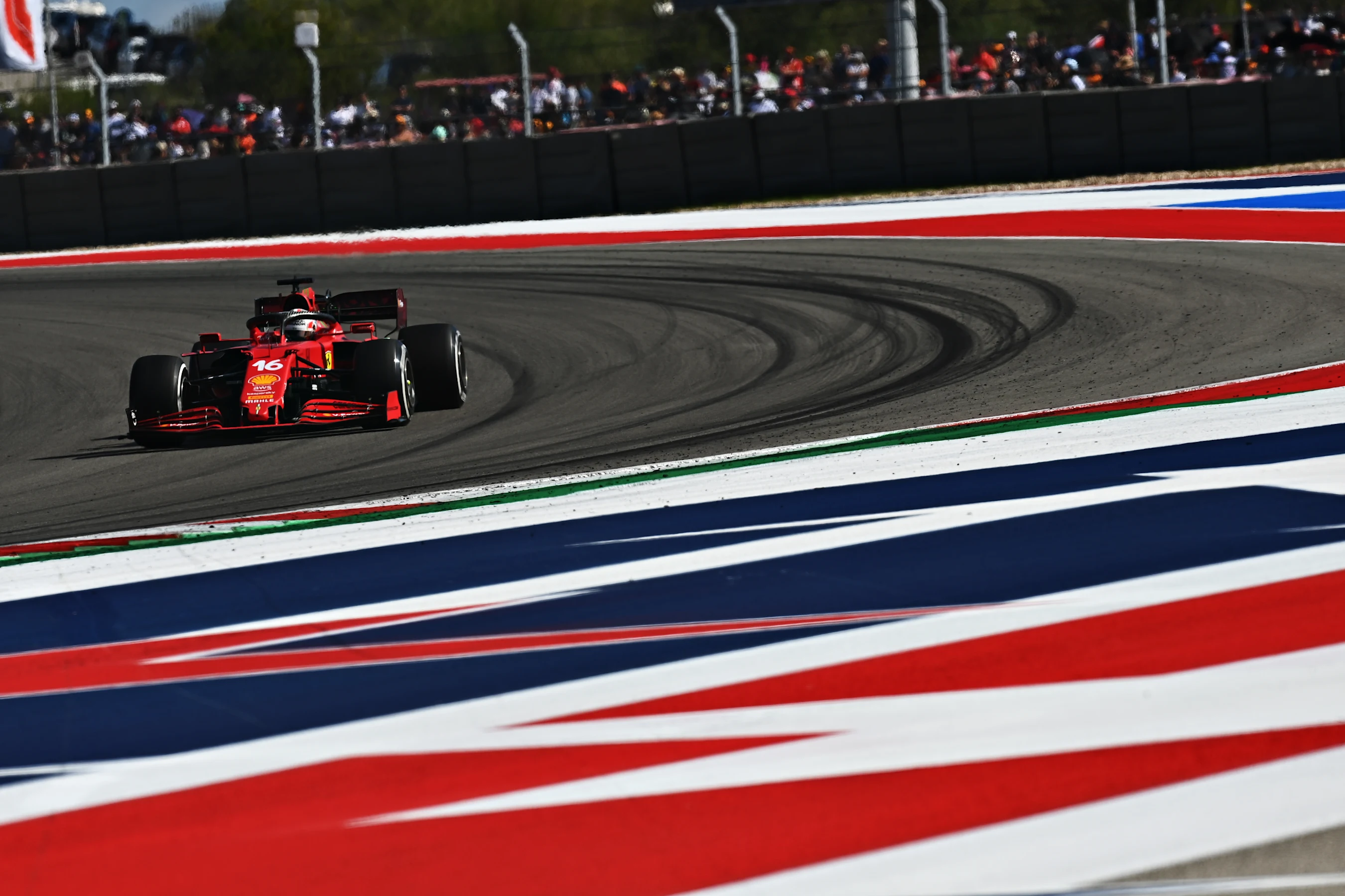 AUSTIN, TEXAS - OCTOBER 24: Charles Leclerc of Monaco driving the (16) Scuderia Ferrari SF21 during