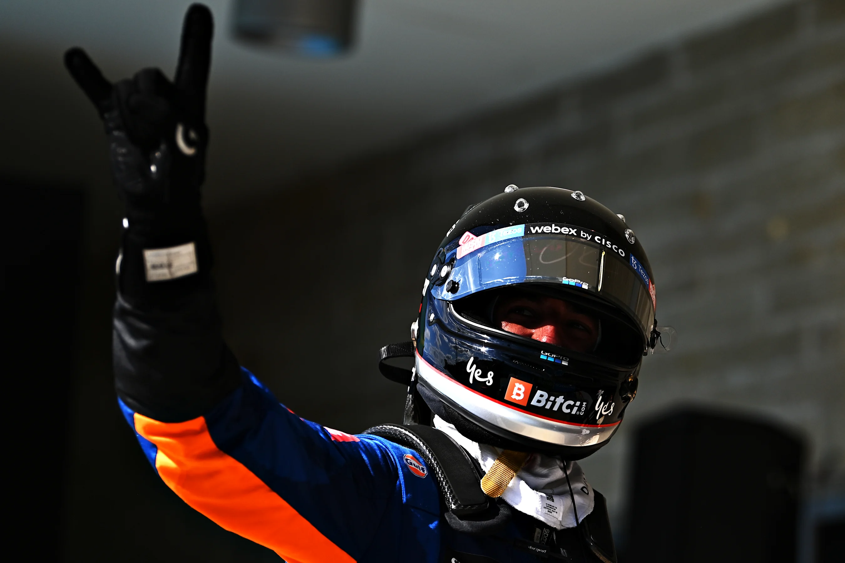AUSTIN, TEXAS - OCTOBER 24: Daniel Ricciardo of Australia and McLaren F1 waves to the crowd from