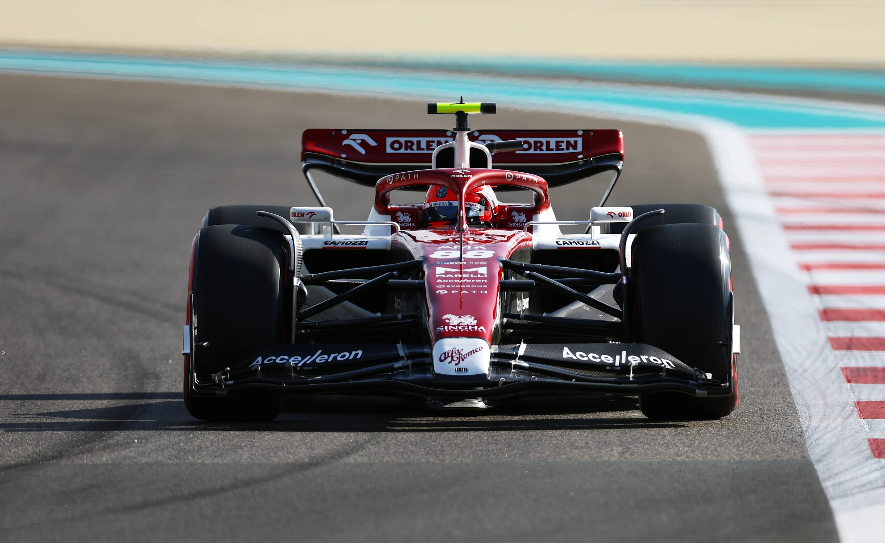 ABU DHABI, UNITED ARAB EMIRATES - NOVEMBER 18: Robert Kubica of Poland driving the (88) Alfa Romeo