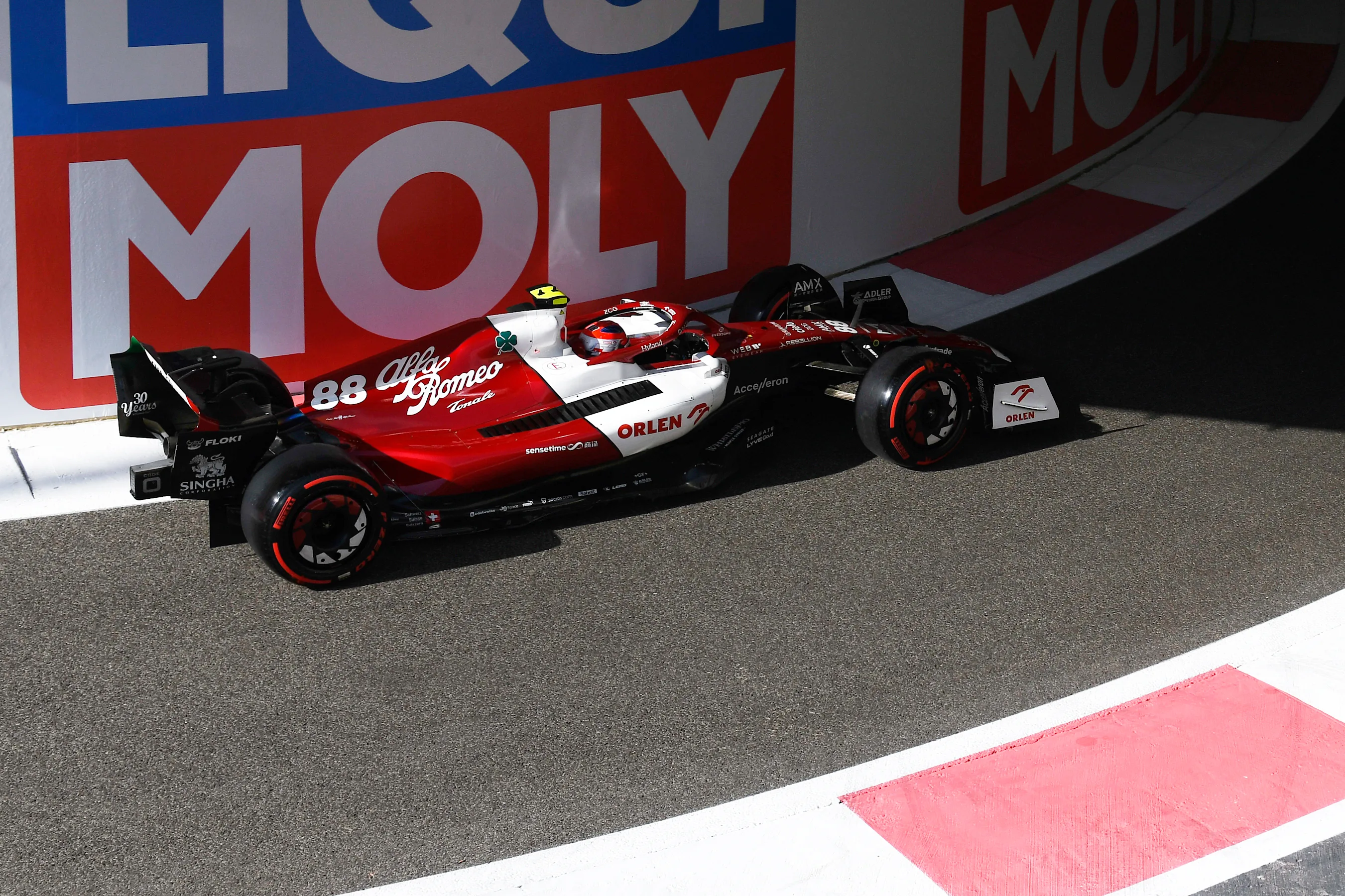 ABU DHABI, UNITED ARAB EMIRATES - NOVEMBER 18: Robert Kubica of Poland driving the (88) Alfa Romeo