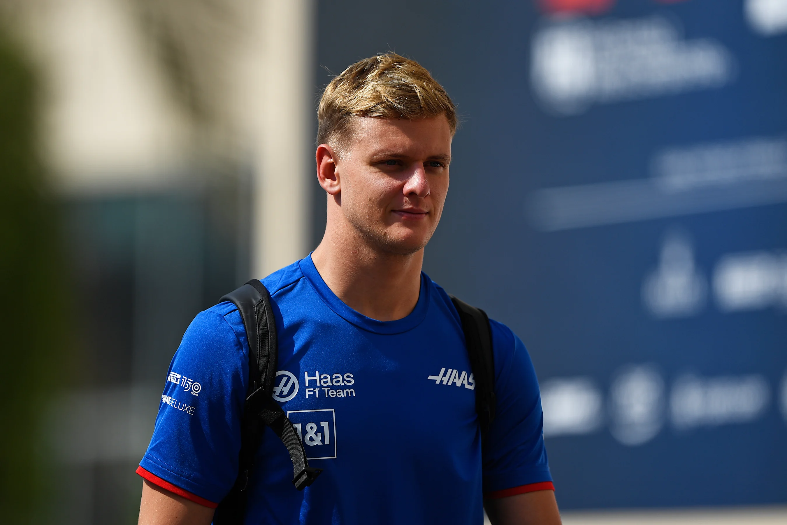 ABU DHABI, UNITED ARAB EMIRATES - NOVEMBER 19: Mick Schumacher of Germany and Haas F1 walks in the