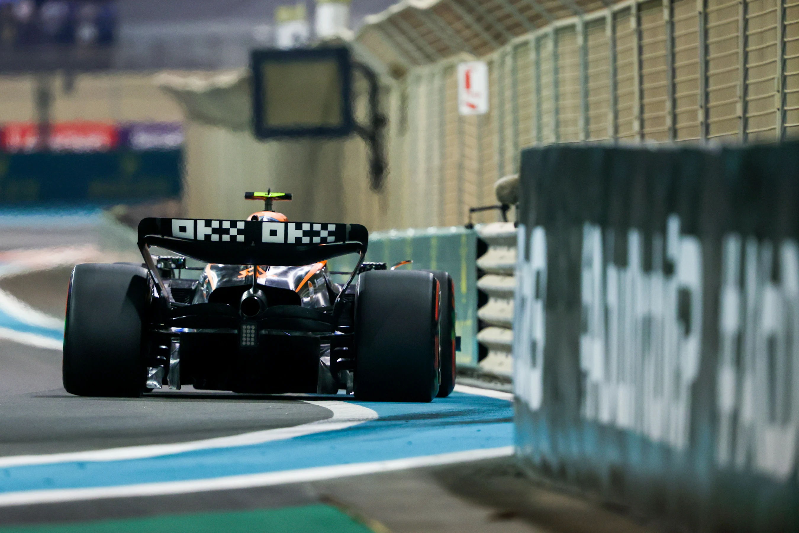 ABU DHABI, UNITED ARAB EMIRATES - NOVEMBER 19: Lando Norris of Great Britain driving the (4)
