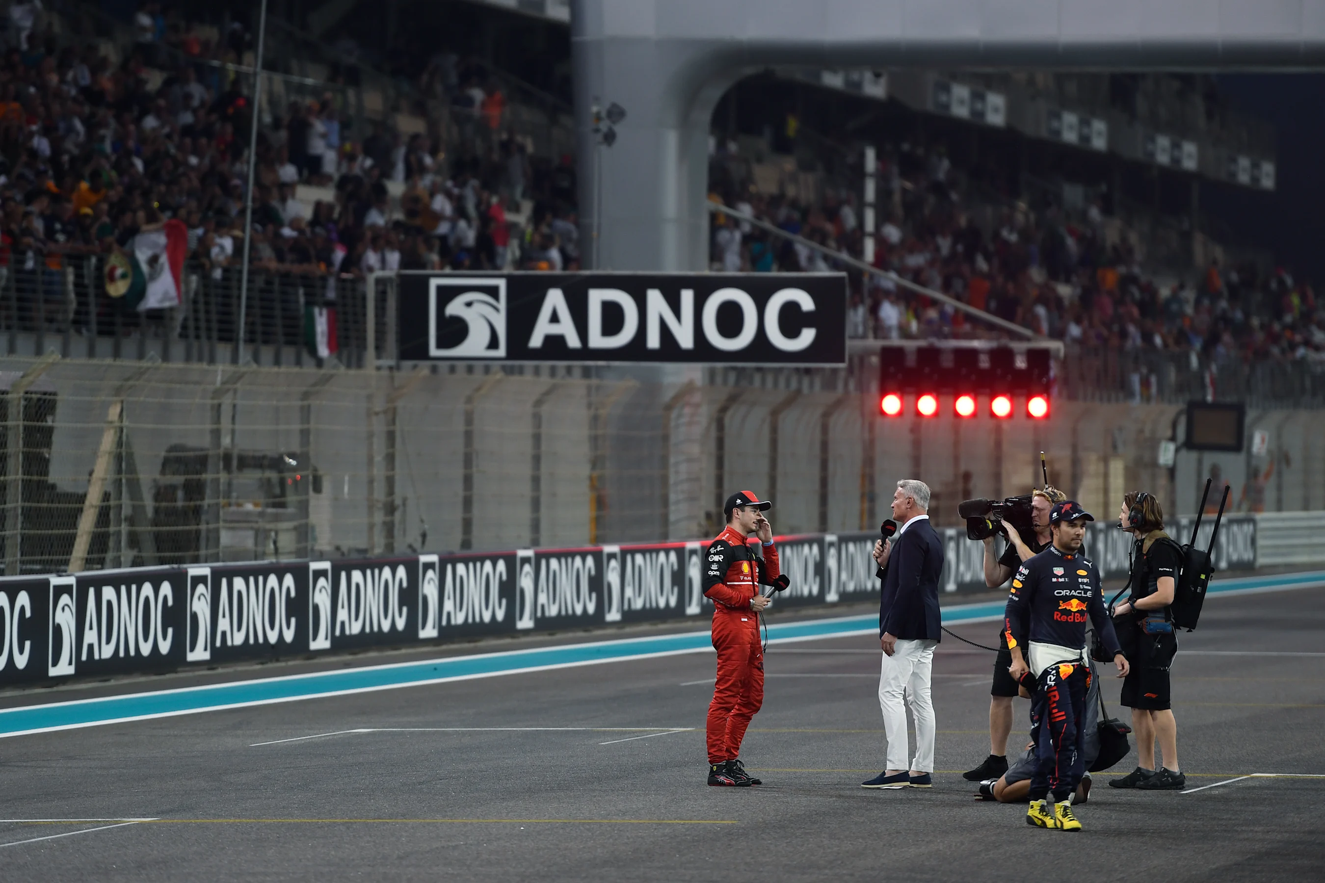 ABU DHABI, UNITED ARAB EMIRATES - NOVEMBER 19: Third placed qualifier Charles Leclerc of Monaco and