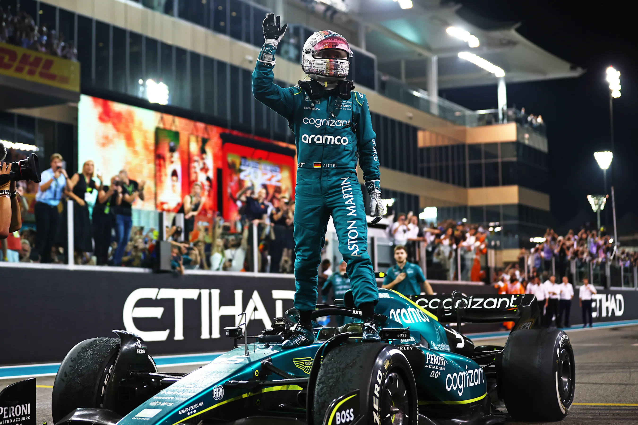 ABU DHABI, UNITED ARAB EMIRATES - NOVEMBER 20: Tenth placed Sebastian Vettel of Germany and Aston